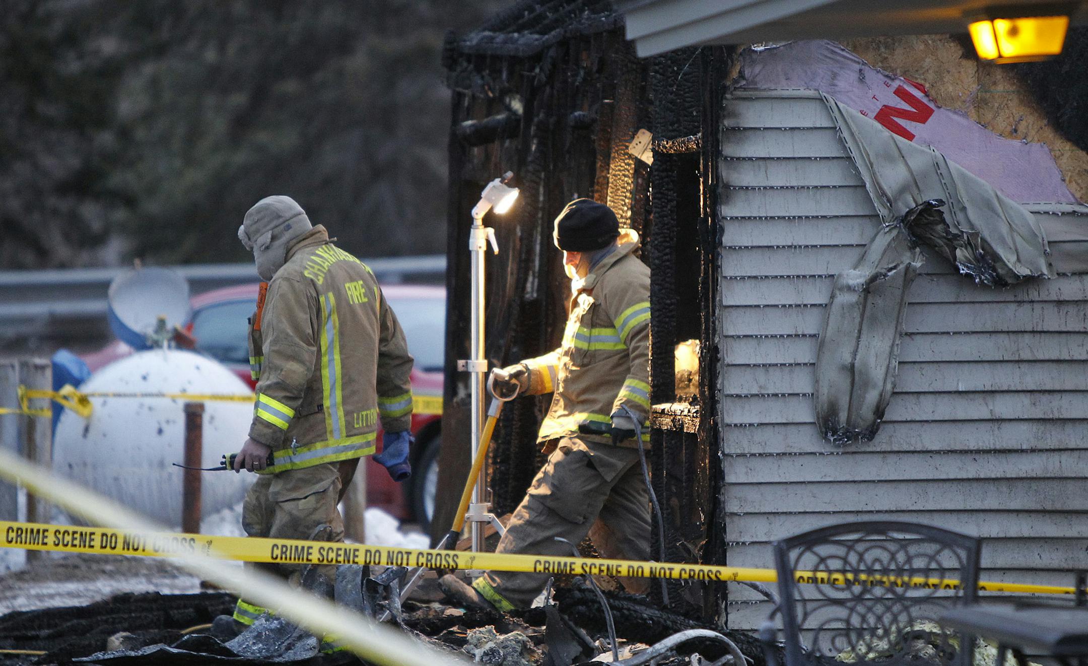Firefighters worked the scene of a fire in Chanhassen, MN, Monday, March 17, 2014. ] (ELIZABETH FLORES/STAR TRIBUNE) ELIZABETH FLORES • eflores@startribune.com