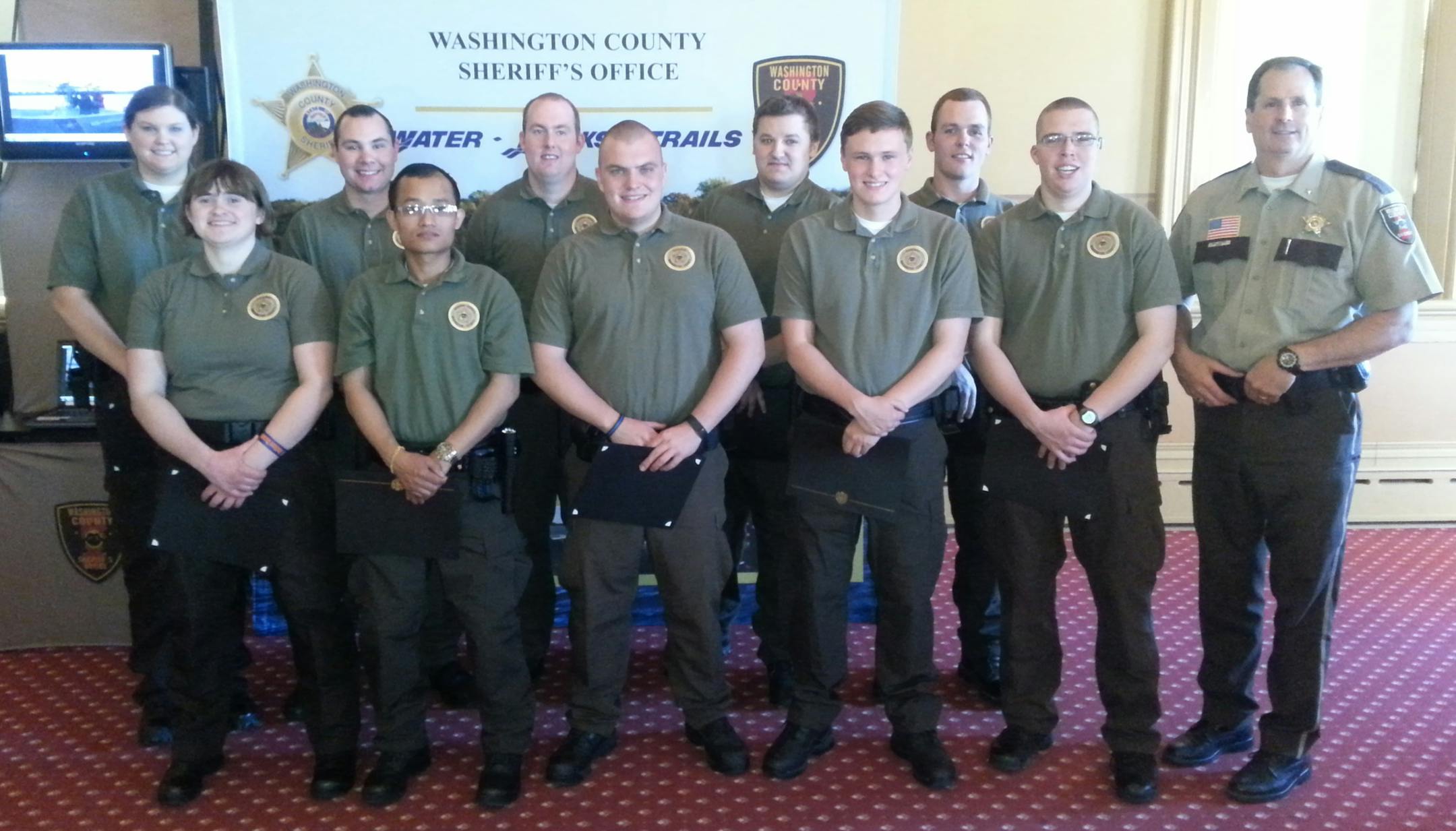 Pictured with Sheriff William Hutton, from front left, are new reserves Miranda Zabel, Jackson Tun, Brian Eich, Brett Dunn and Andrew LeMay, In back, from left, are Megan Shelley, Tyler Freeman, Scott Carlson, Joshua Jedlicka and Mike Clemens.