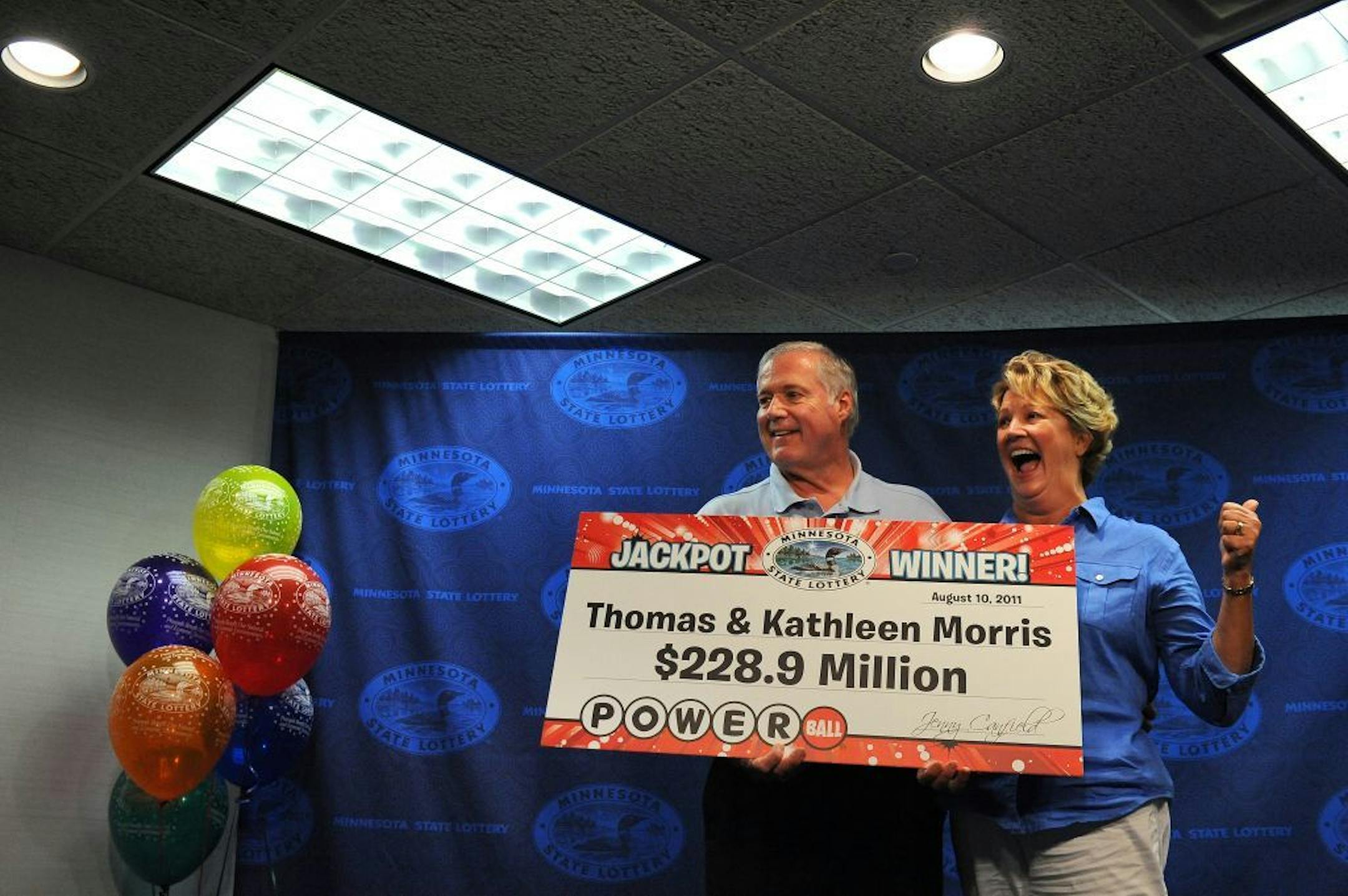 Thomas and Kathleen Morris the couple accepted a giant representative check for their winnings totaling $228 million during a press conference August 12, 2011at the Minnesota State Lottery building in Roseville.