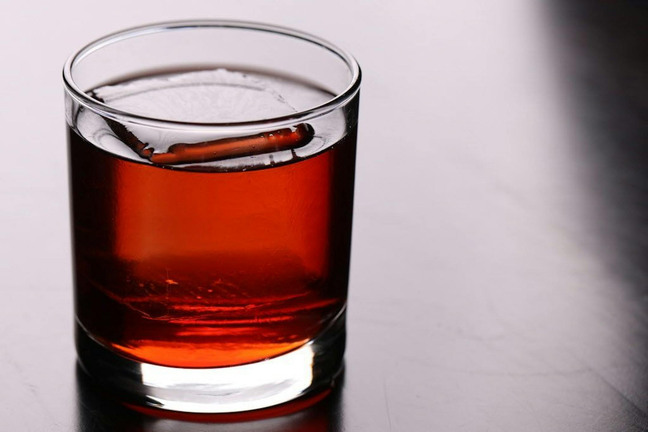 Pictured is the Bermuda triangle a negroni with barrel aged gin, fortified wine, campari and smoked sea salt.