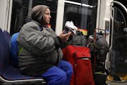 A homeless woman who identified herself only as Rita talks about spending nights on the Metro Transit light-rail trains to keep out of the cold in Min