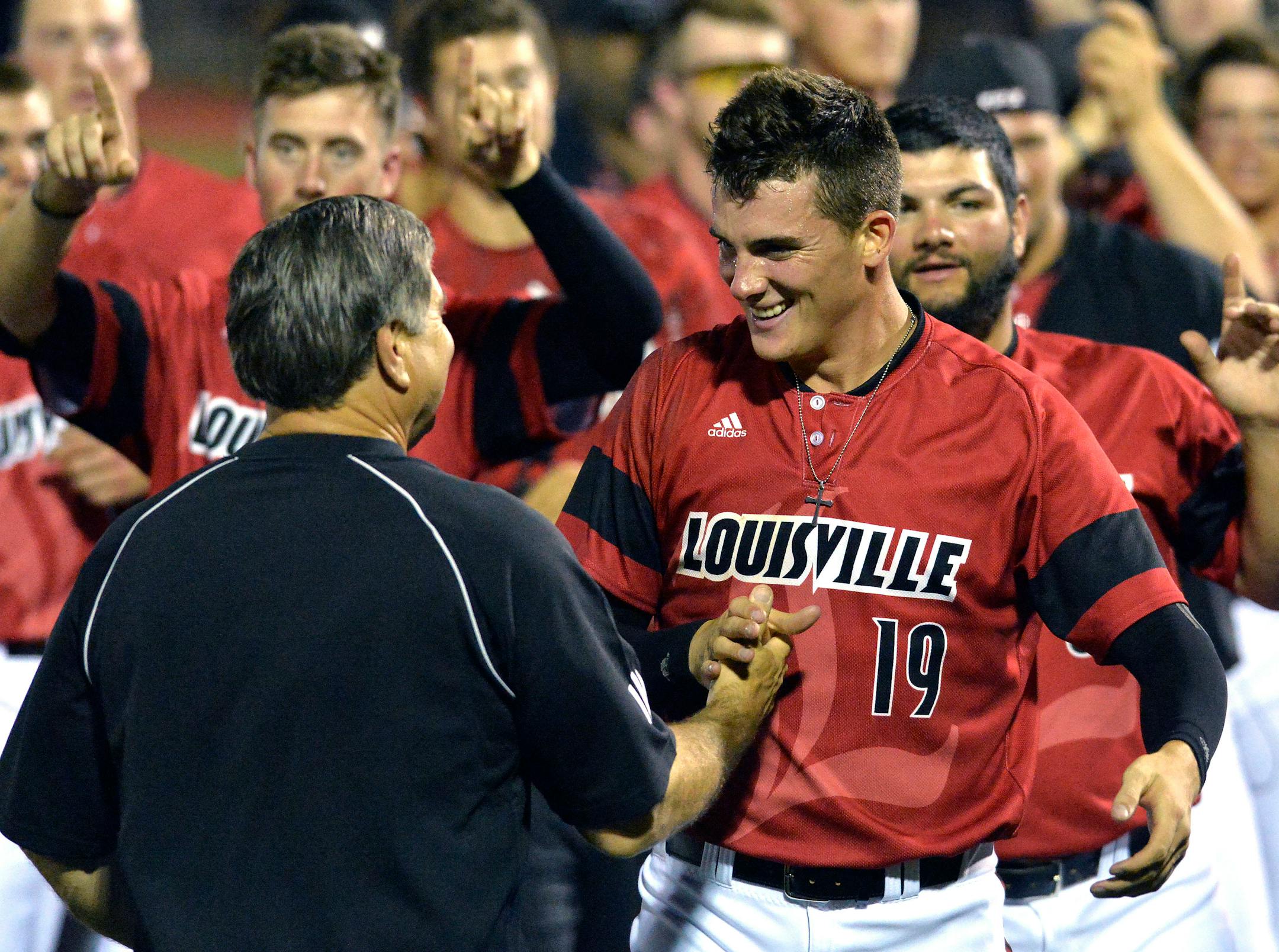 Louisville's Nick Burdi, right
