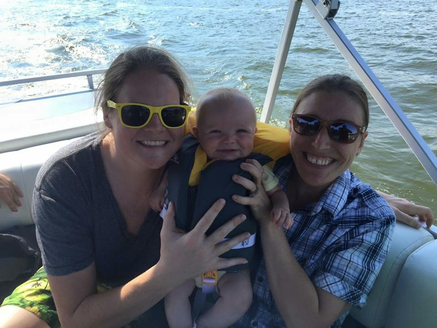 Wisconsin couple Jessamy, left, and Chelsea Torres will now be able to have both their names on their son Asher&#x2019;s birth certificate following a U.S. District Court ruling this week.