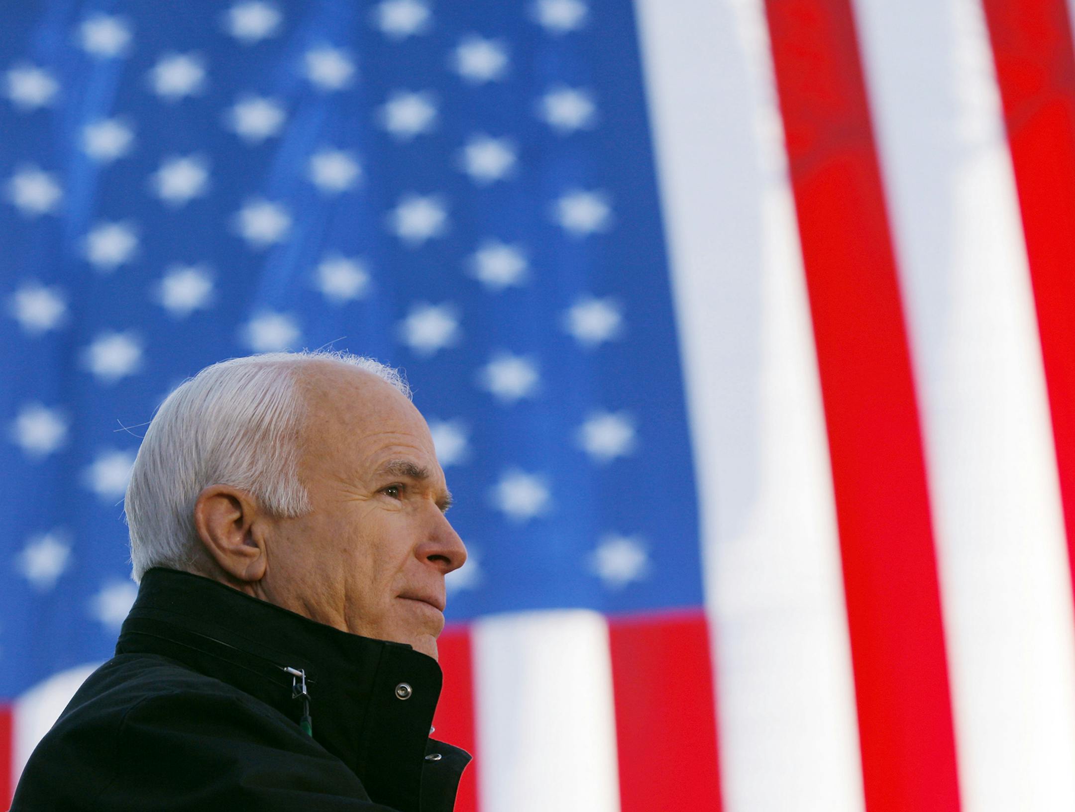 U.S. Republican presidential nominee Senator John McCain (R-AZ) speaks at a campaign rally in Defiance, Ohio October 30, 2008. McCain is on a two-day campaign bus tour through the state of Ohio. REUTERS/Brian Snyder (UNITED STATES) US PRESIDENTIAL ELECTION CAMPAIGN 2008 (USA) - GM1E4AV00ZR01