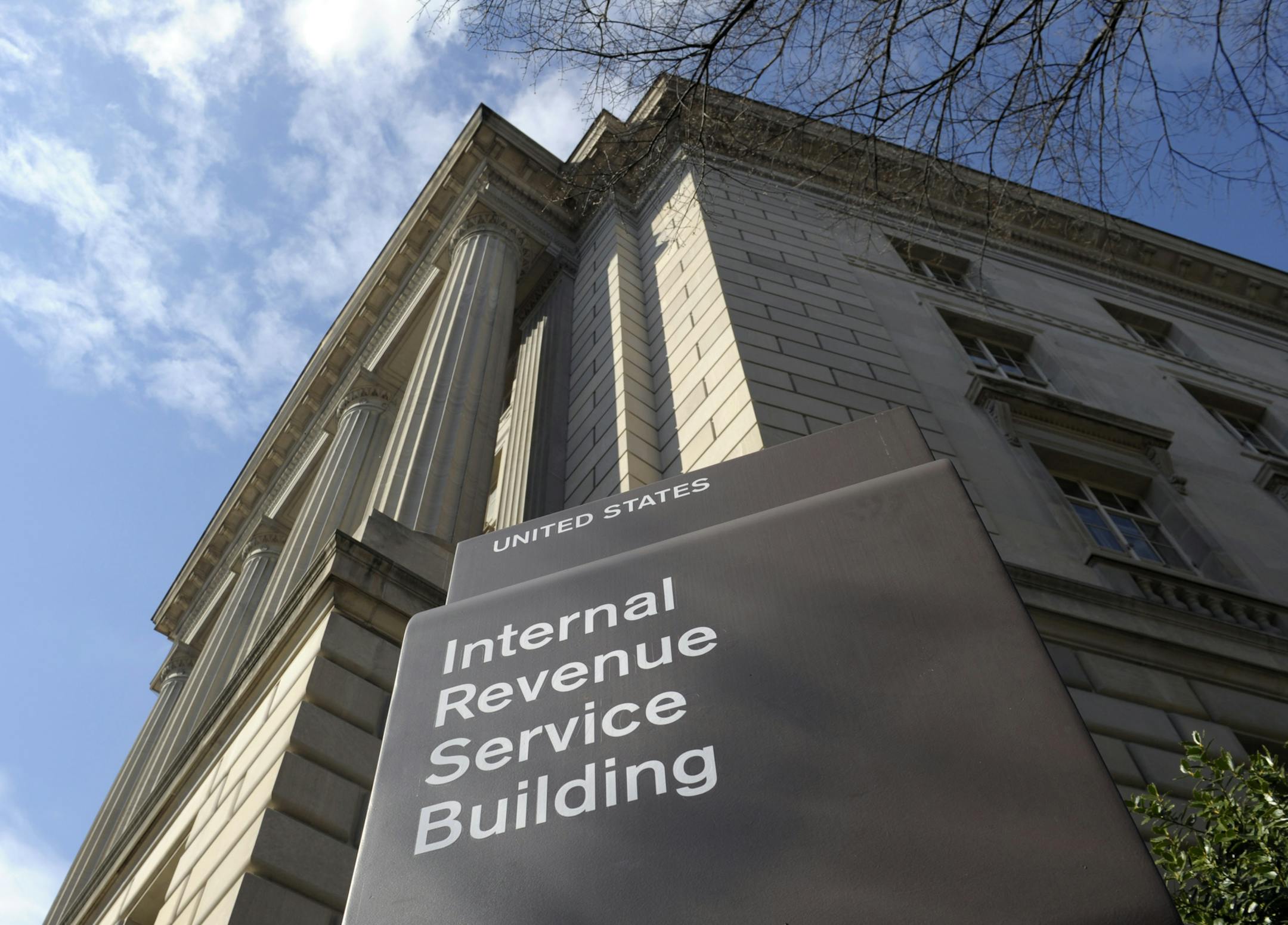 This photo taken March 22, 2013, shows the exterior of the Internal Revenue Service (IRS) building in Washington. The IRS issued $4 billion in fraudulent tax refunds last year to people using stolen identities, with some of the money going to addresses in Bulgaria, Lithuania and Ireland, according to a Treasury report released Thursday. The IRS sent a total of 655 tax refunds to a single address in Lithuania, and 343 refunds went to a lone address in Shanghai. (AP Photo/Susan Walsh)