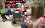 The Rosemount-Apple Valley-Eagan district is weighing a $19 million levy increase. Above, kindergarteners watched a show during snack time at Glacier 