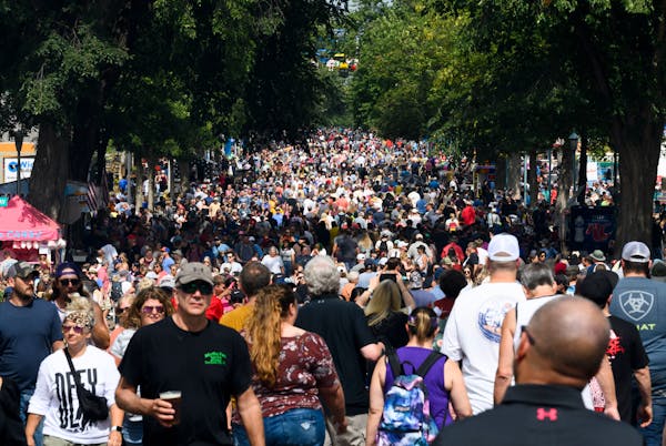 Thousands of people fill Underwood street Monday, Sept. 5, 2022 during the last day of the Minnesota State Fair in Falcon Heights, Minn.. ] aaron.lavi