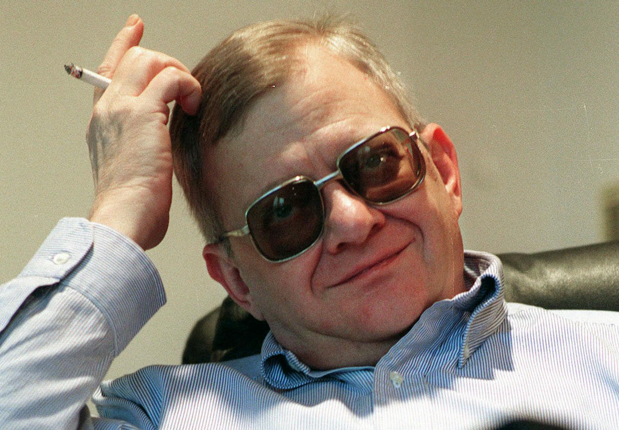 FILE - In this Feb. 4, 1998 file photo, writer Tom Clancy appears at his home in Calvert County, Md. Clancy, the bestselling author of more than 25 fiction and nonfiction books for the Penguin Group, died on Oct. 1, 2013 in Baltimore, Md. He was 66. (AP Photo/Vince Lupo)