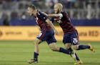 United States' Jordan Morris (8) and Michael Bradley celebrate after Morris scored a goal against Jamaica during the second half of the Gold Cup final