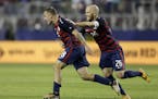 United States' Jordan Morris (8) and Michael Bradley celebrate after Morris scored a goal against Jamaica during the second half of the Gold Cup final