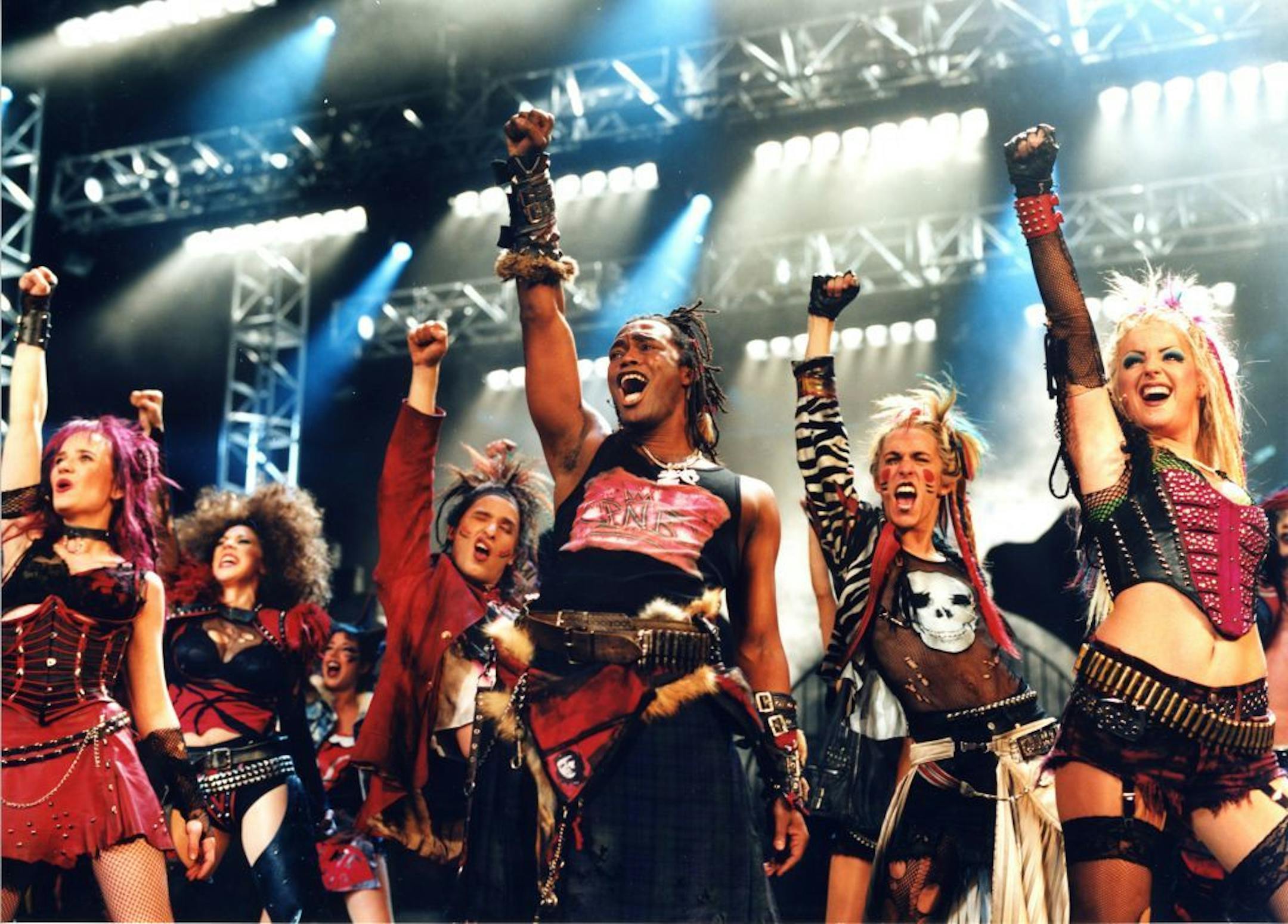 This image released by Shore Fire Media shows the cast of "We Will Rock You." Boasting an original futuristic story by British comedian and writer Ben Elton, the show contains 24 of Queen's biggest songs including "Another One Bites the Dust," "Crazy Little Thing Called Love," "We Are The Champions," "Bohemian Rhapsody" and "We Will Rock You." The tour launches in Baltimore on Oct. 15 and hits more than a dozen states and Canada over the next year, ending next summer in Los Angeles.