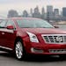 The 2013 Cadillac XTS shares a platform with the Buick LaCrosse.