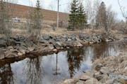 Duluth’s Miller Creek along Sundby Road, seen next to the Kohl’s department store. Across the road is the site of a hotel development.