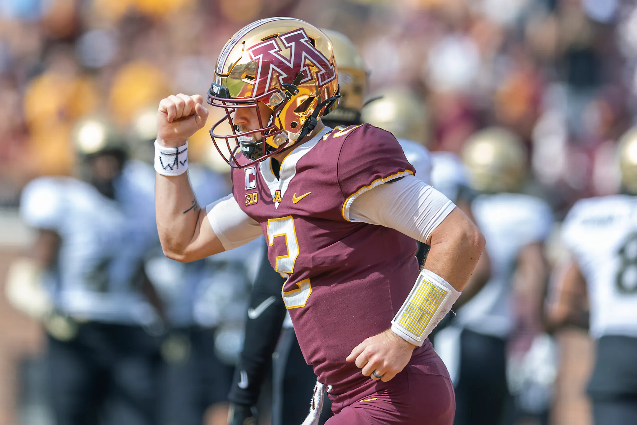 Autman Gophers steamroll Colorado 49-7 but lose receiver Chris Autman-Bell to ...