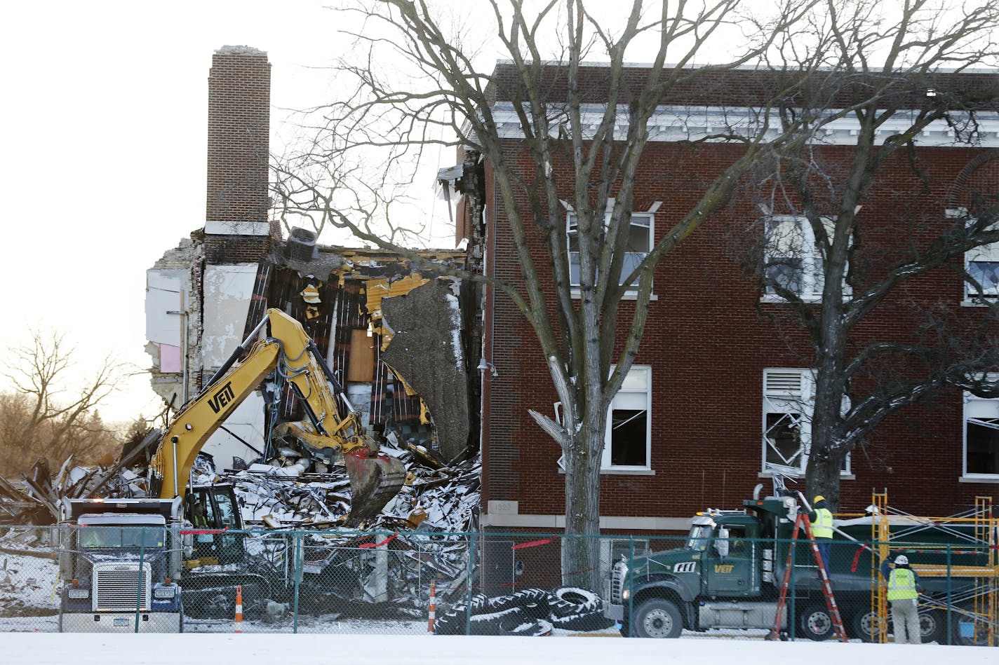 Construction crews begin demolition of the Minnehaha Academy campus damaged by a natural gas explosion. Over the next, two weeks, will be working to remove debris from the site.] Richard Tsong-Taatarii&#xef;rtsong-taatarii@startribune.com