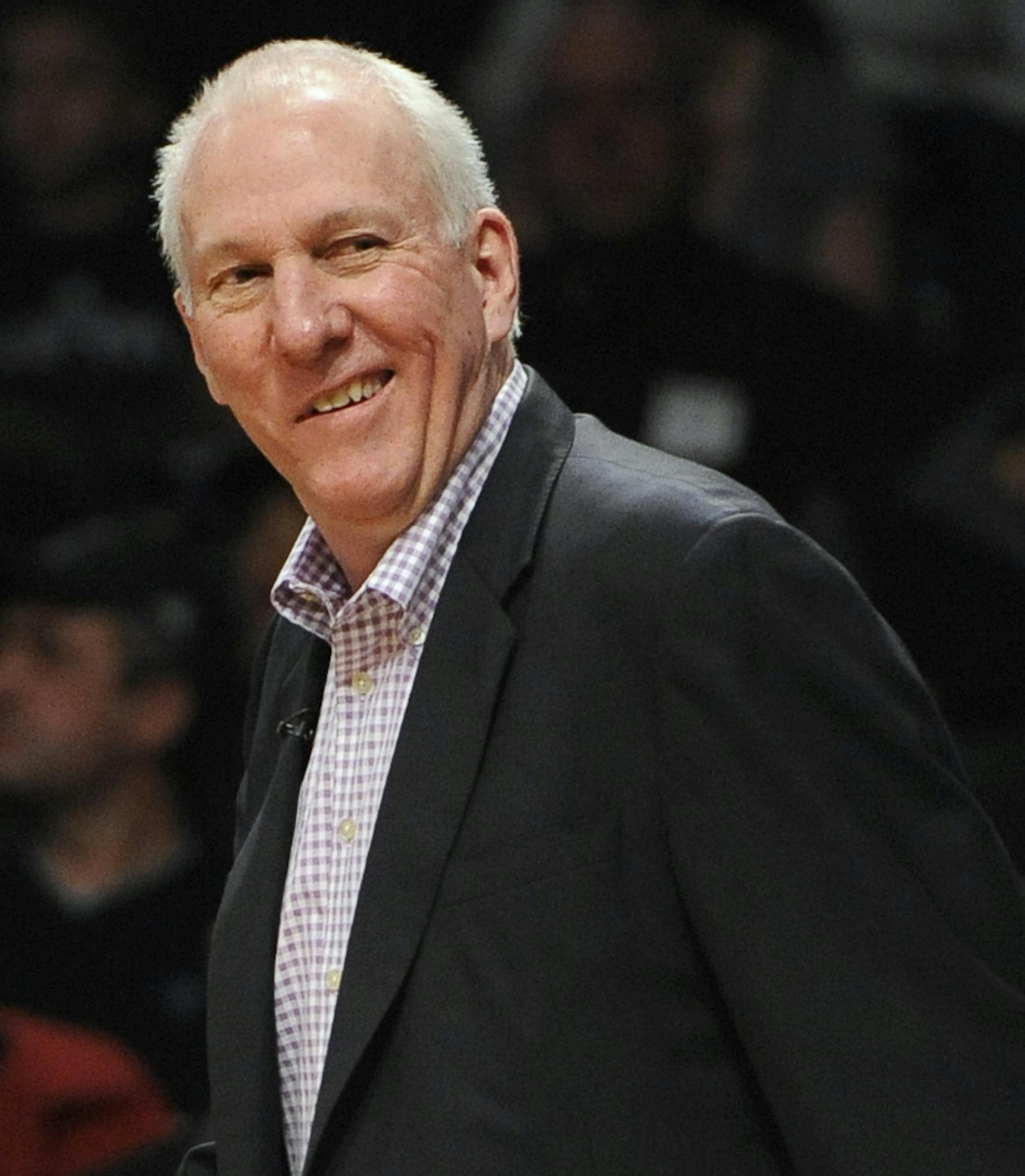 San Antonio Spurs Head Coach Gregg Popovich reacts to play during an NBA basketball game against the Brooklyn Nets on Sunday, Feb., 10, 2013 at Barclays Center in New York. (AP Photo/Kathy Kmonicek) ORG XMIT: NYOTK130