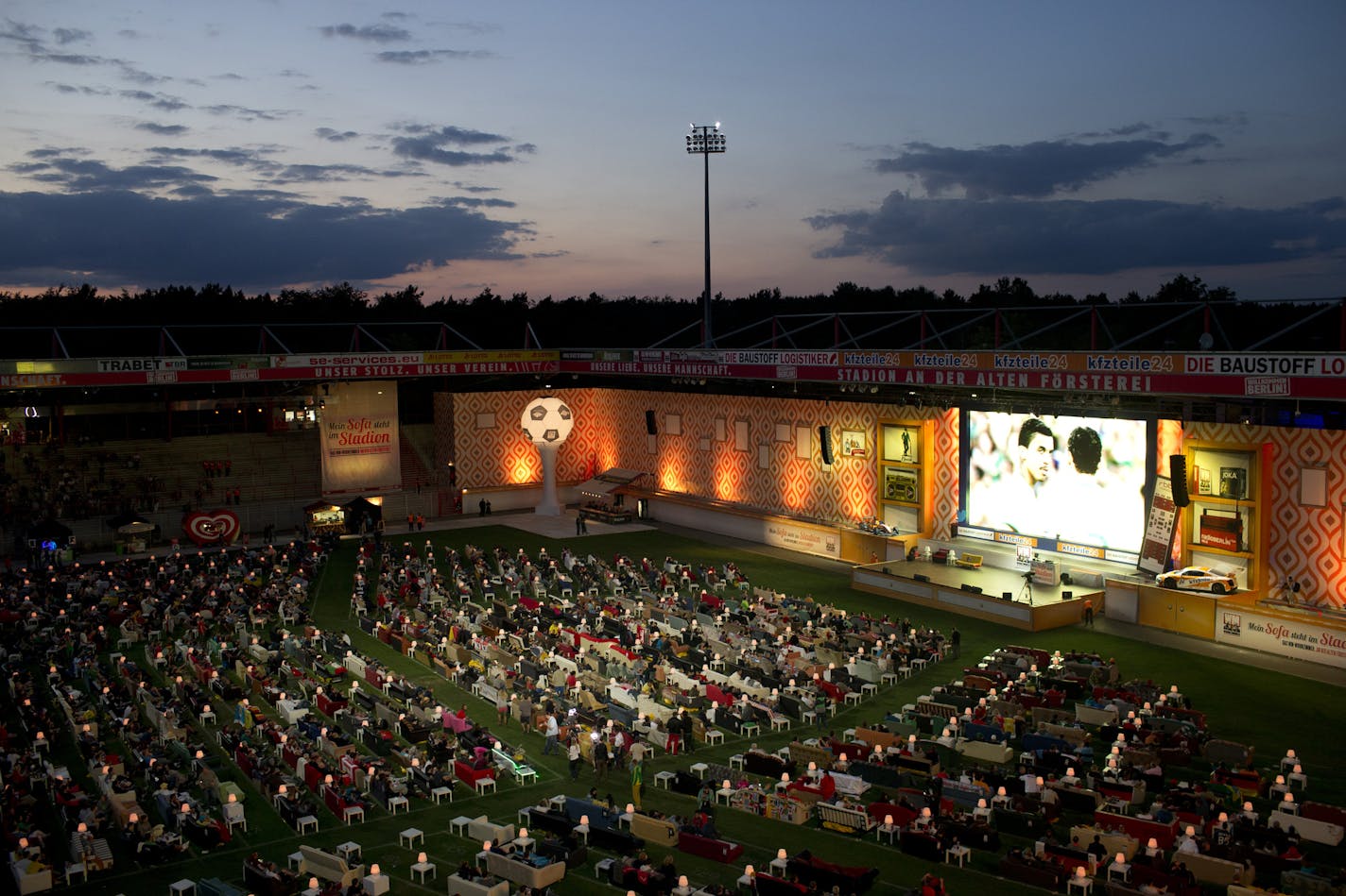 German soccer fans watched the opening game of the 2014 World Cup while sitting on sofas in the FC Union Stadium in Berlin on June 12, 2014.