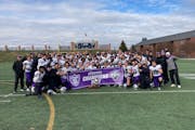 Tommies players celebrated their Pioneer Football League championship Saturday in Indianapolis following their 27-13 victory at Butler.