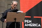 American writer Paul Auster speaks during a reading event in solidarity of support for author Salman Rushdie outside the New York Public Library in 20