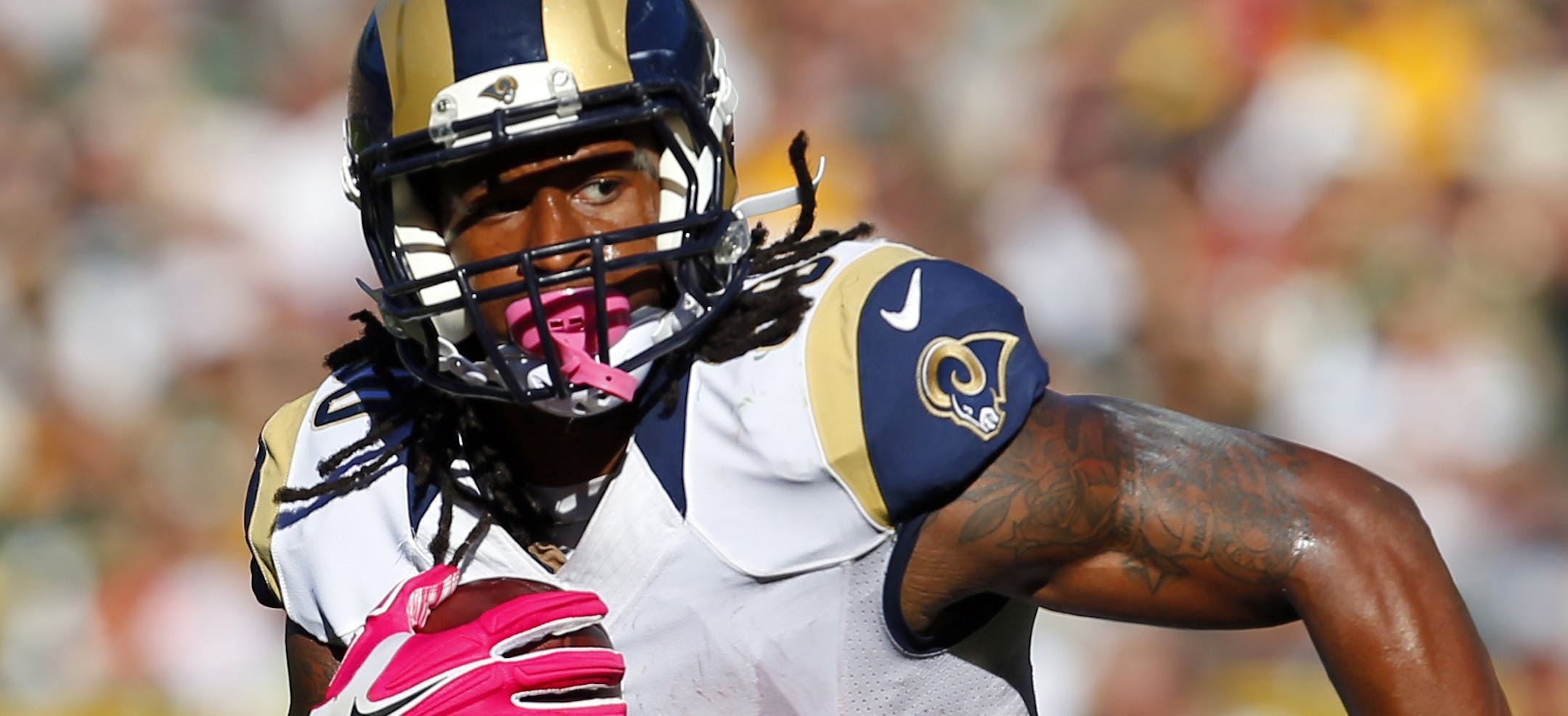 St. Louis Rams running back Todd Gurley (30) runs the ball against the Green Bay Packers during an NFL football game Sunday, Oct. 11, 2015, in Green Bay, Wis. The Packers won 24-10. (Jeff Haynes/AP Images for Panini) ORG XMIT: MIN2015102118511052