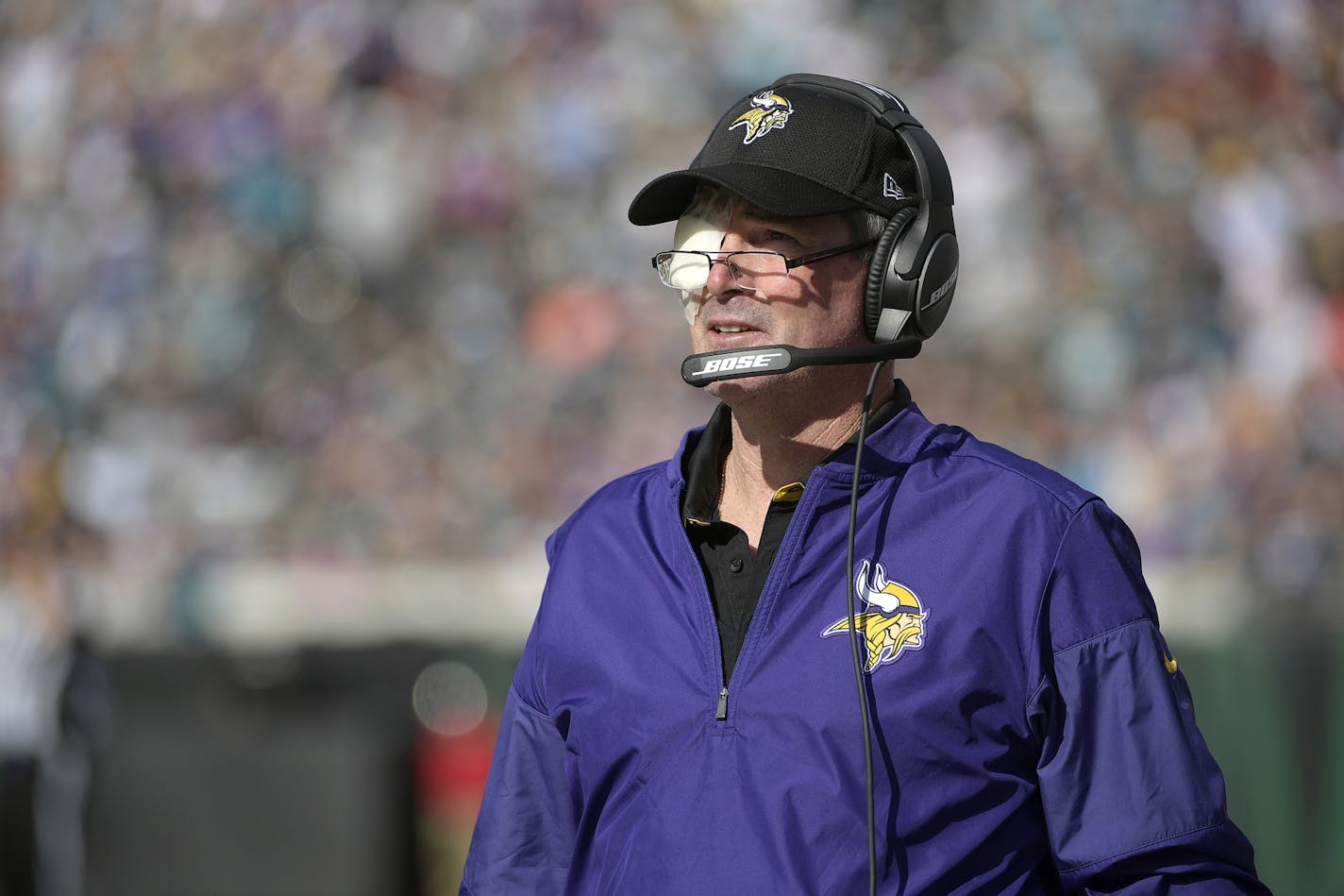 Minnesota Vikings head coach Mike Zimmer watches from the sideline during the first half of an NFL football game against the Jacksonville Jaguars in Jacksonville, Fla., Sunday, Dec. 11, 2016. (AP Photo/Phelan M. Ebenhack)