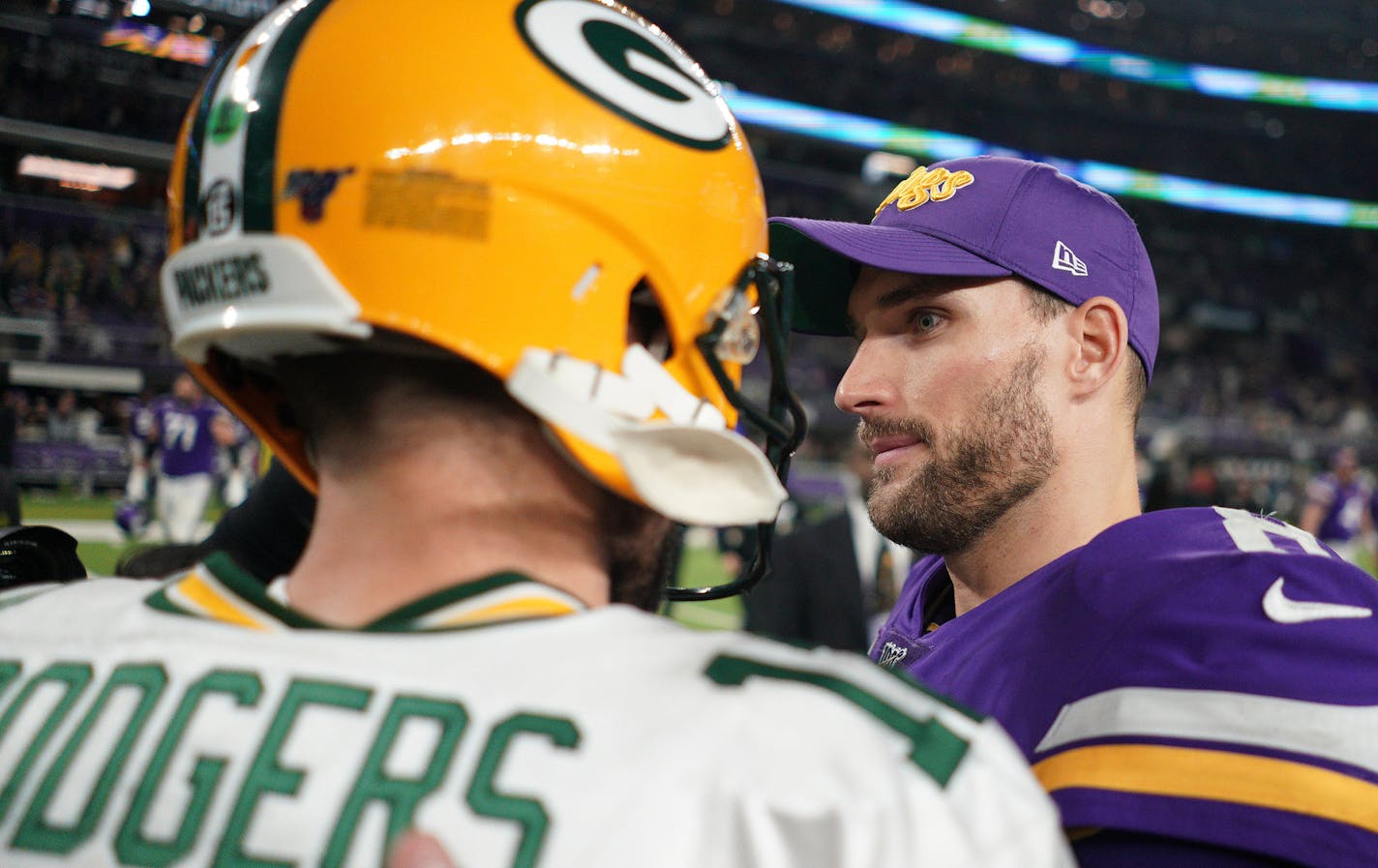 A wide eyed Minnesota Vikings quarterback Kirk Cousins (8) greeted Green Bay Packers quarterback Aaron Rodgers (12) after Monday night's loss. ] ANTHONY SOUFFLE • anthony.souffle@startribune.com The Minnesota Vikings played the Green Bay Packers in an NFL game Monday, Dec. 23, 2019 at U.S. Bank Stadium in Minneapolis. ORG XMIT: MIN1912232250251139