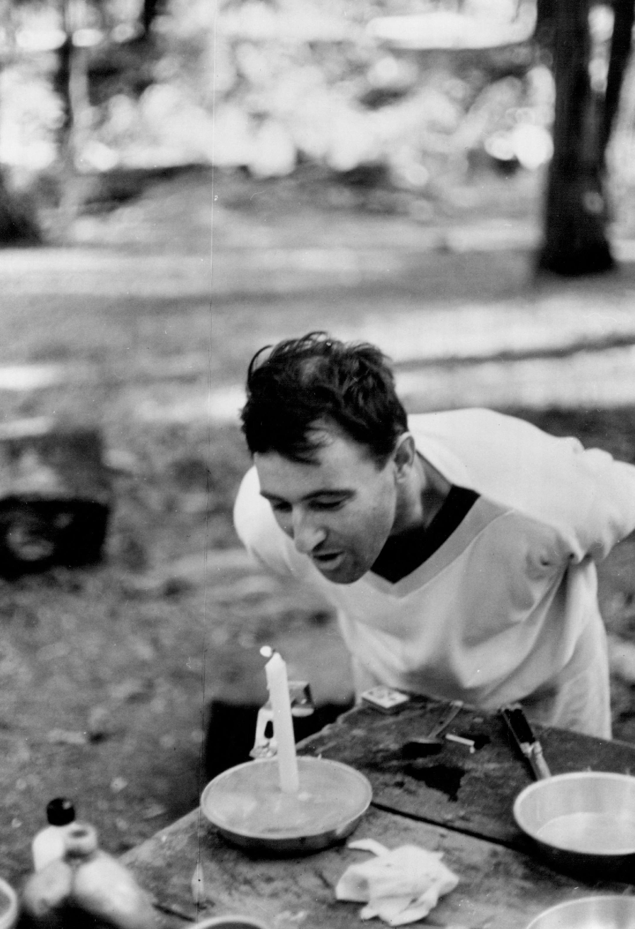 April 25, 1968: Jim Klobuchar has birthday cake In a mess tin.
