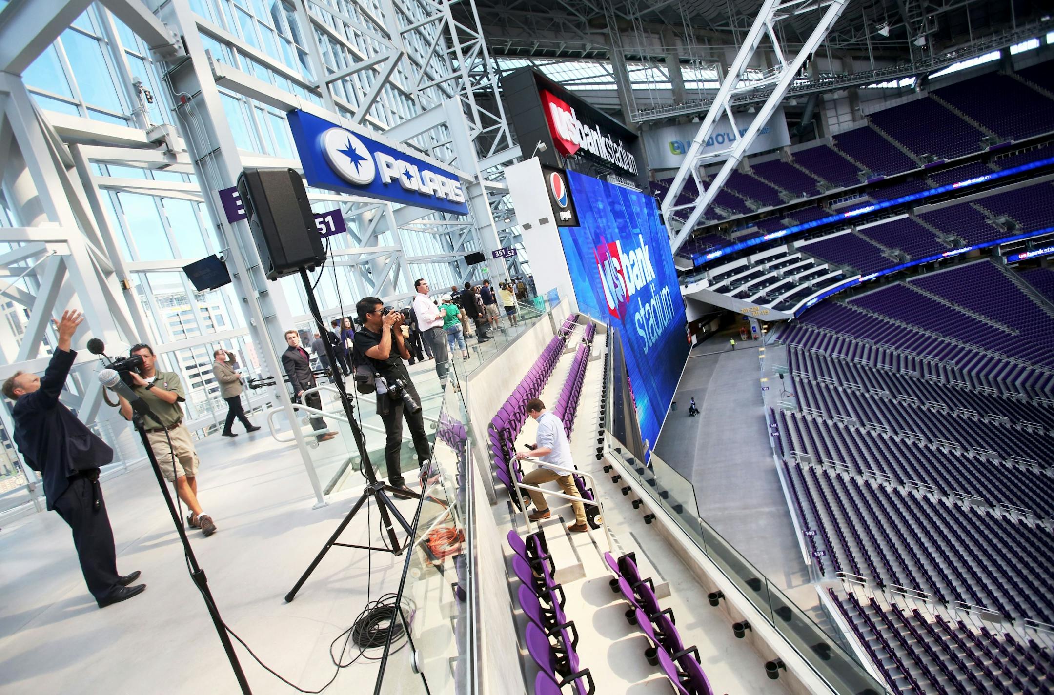 Media members get a look at the stadium from the Legacy Gate during a media tour Tuesday, July 19, 2016, at U.S. Bank Stadium in Minneapolis, MN.