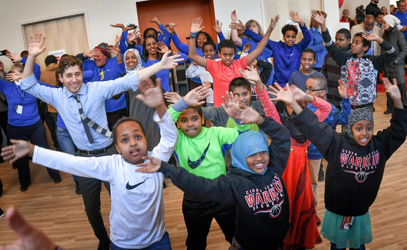 Minneapolis Mayor Jacob Frey and State Rep Ilhan Omar were the only elected officials brave enough to join students from Cedar Riverside Community School to take part in a Zumba class at the center as Minnesota Super Bowl Host Committee and Target celebrated the opening of the Wellness Hub at People's Center Clinics & Services, part of the host committee's 52 Weeks of Giving program. ] GLEN STUBBE &#x2022; glen.stubbe@startribune.com Tuesday, January 16, 2018 Minnesota Super Bowl Host Committee