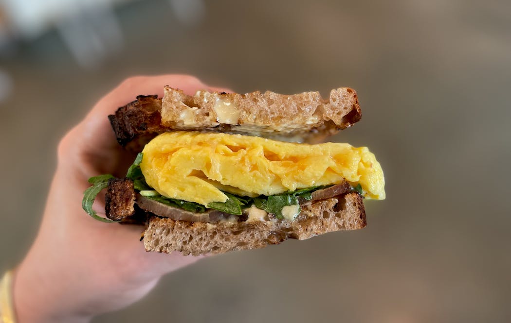 The custard-like interior of the omlette inside Churchill Street’s egg sandwich is the ideal mix of creamy and set eggs.