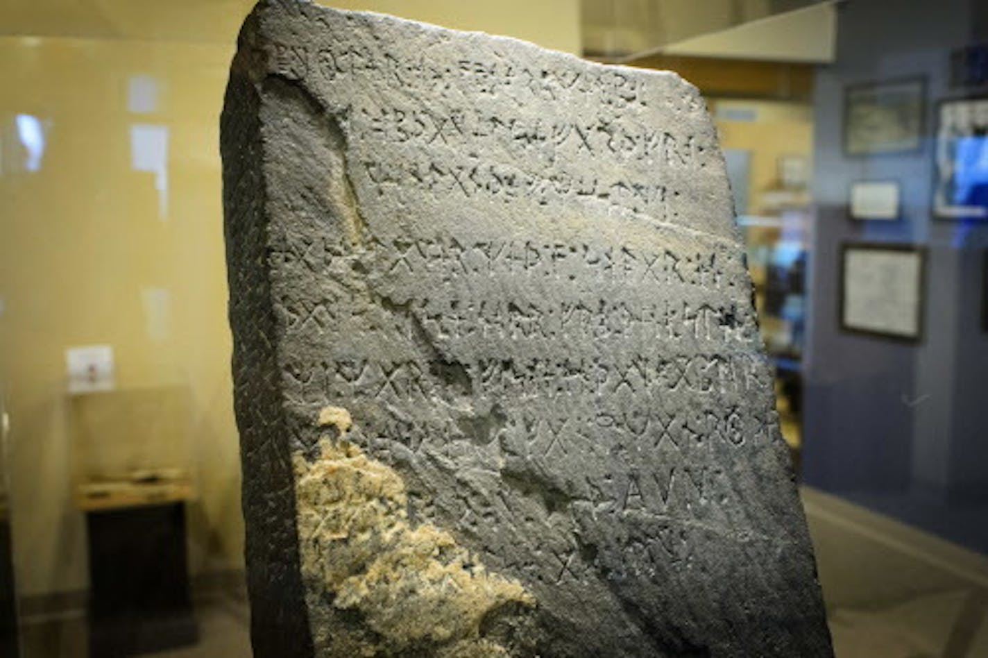 The Kensington Runestone on display in the Runestone Museum, Alexandria, MN. It was discovered in 1898, in the roots of an aspen tree on the Olof 'hman farm near Kensington, MN (15 miles southwest of Alexandria). The Runestone led researchers from around the world and across the centuries on a quest to explain how the artifact, dated 1362, could show up in North America.    ] GLEN STUBBE * gstubbe@startribune.com Tuesday, June 23, 2015  More info at runestonemuseum.org Alexandria, Minnesota