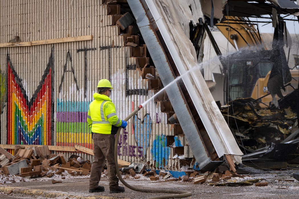 Demolition began at the Kmart on Lake Street in Minneapolis on Tuesday. 