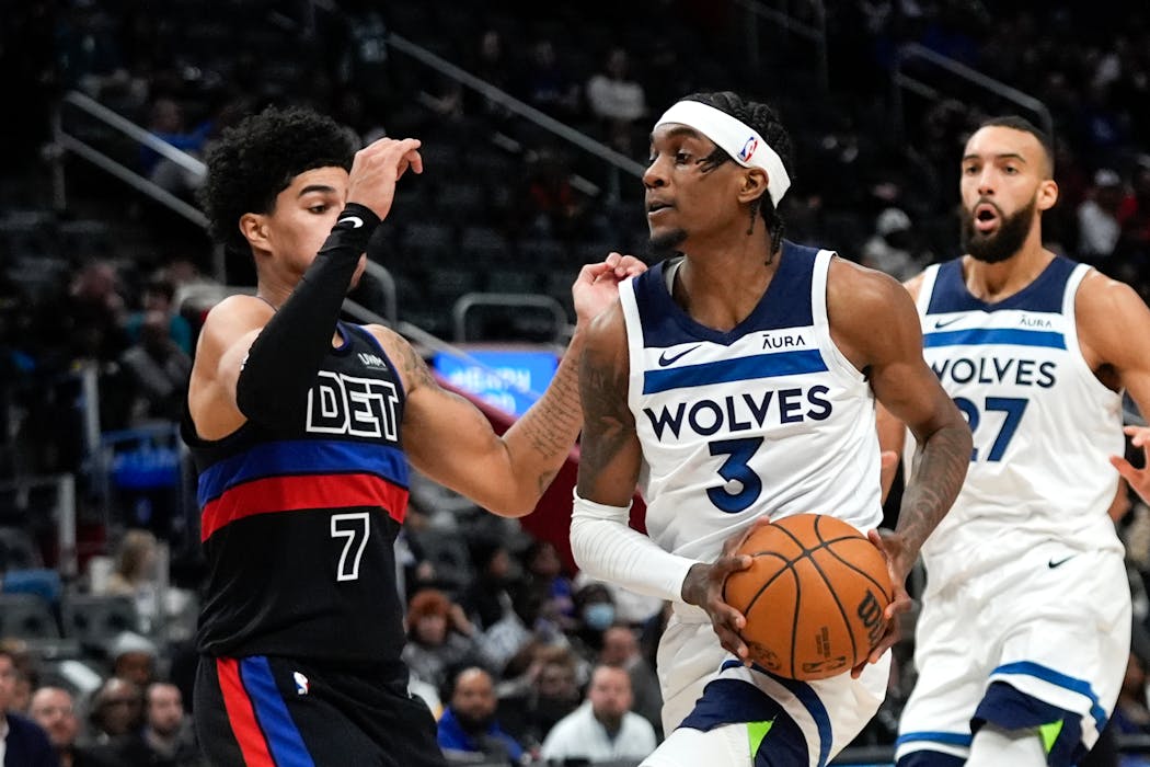 Timberwolves forward Jaden McDaniels, who scored a season-best 23 points, handled the ball against Pistons guard Killian Hayes on Wednesday night.