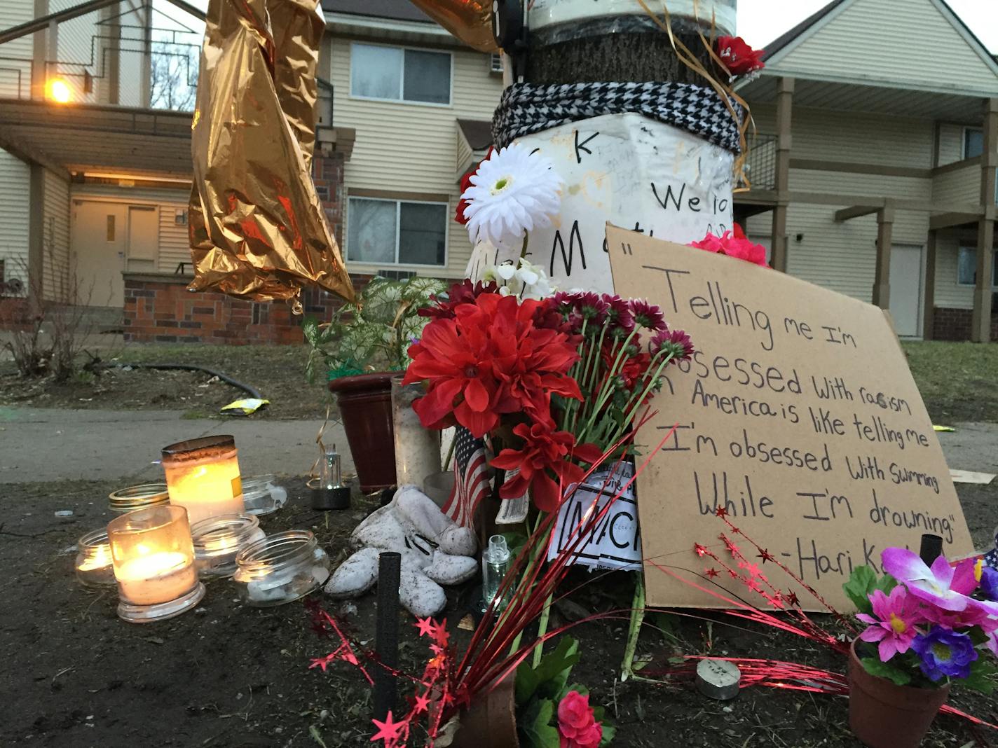 As dawn broke Thursday, candles continued to burn on the day after a decision was made by Hennepin County Attorney Mike Freeman not to charge officers in the killing of Jamar Clark.