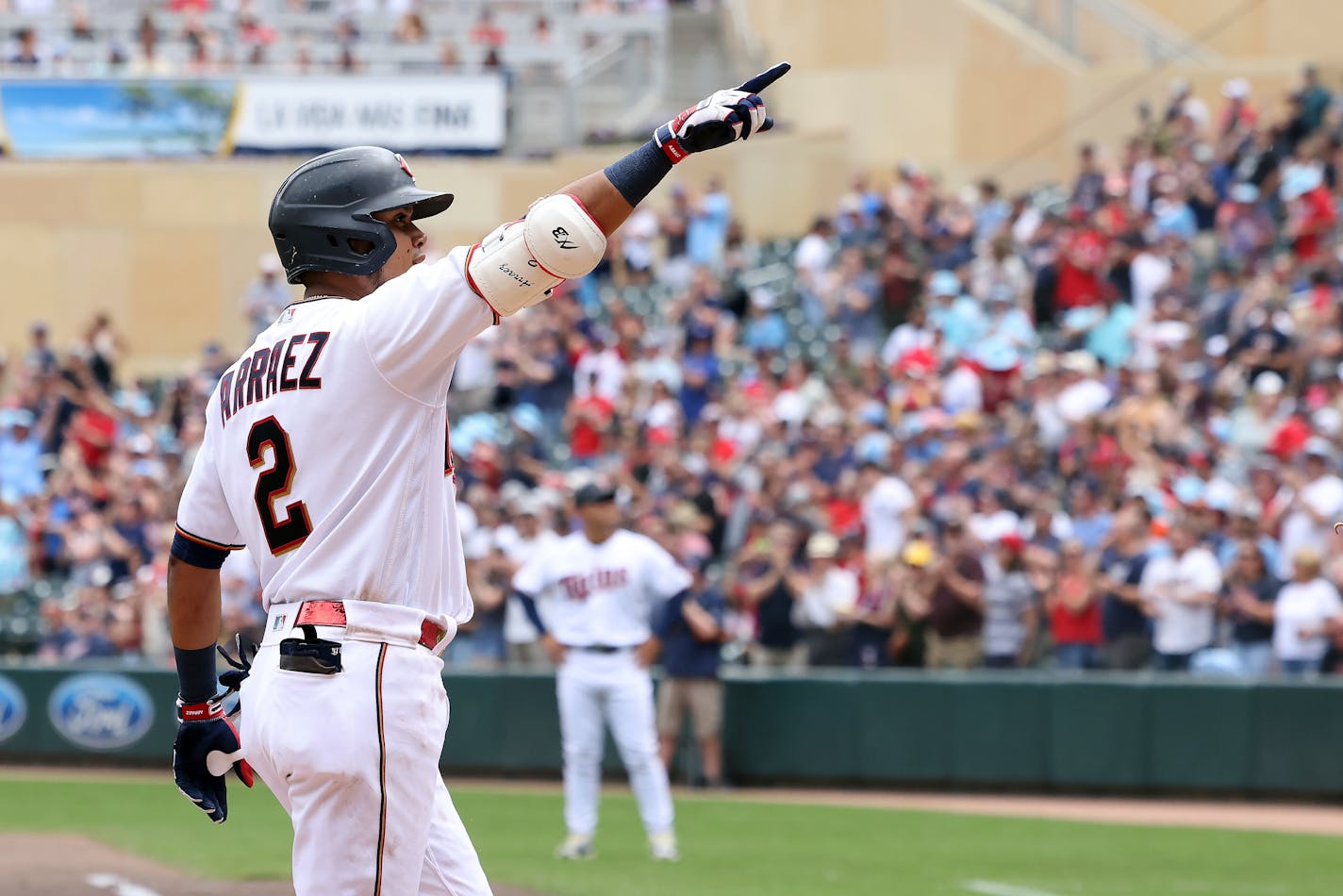 Luis Arraez reacts at home after hitting a grand slam during the third inning against the Tampa Bay Rays on Saturday