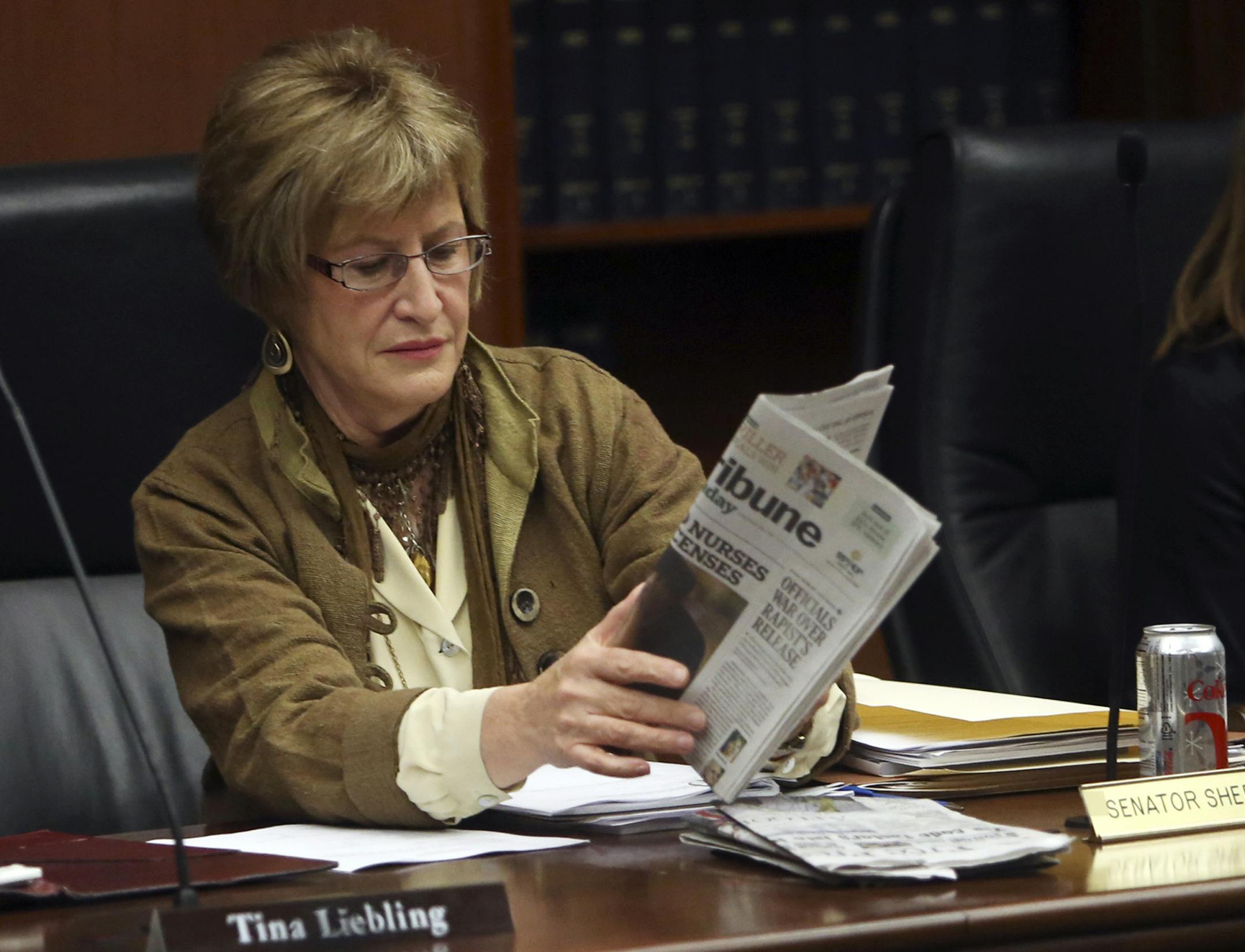 Minnesota Senator Kathy Sheran of the House Health and Human Services Policy Committee and Senate Health, Human Services and Housing Committee held a copy of the Star Tribune before a review of the Board of Nursing's licensing and disciplinary processes Wednesday, Nov. 13, 2013, at the State Office Building in St. Paul, MN.](DAVID JOLES/STARTRIBUNE) djoles@startribune.com Nurses who are repeatedly fired often quickly find jobs for non-hospital employers. Home health care and long-term care facil