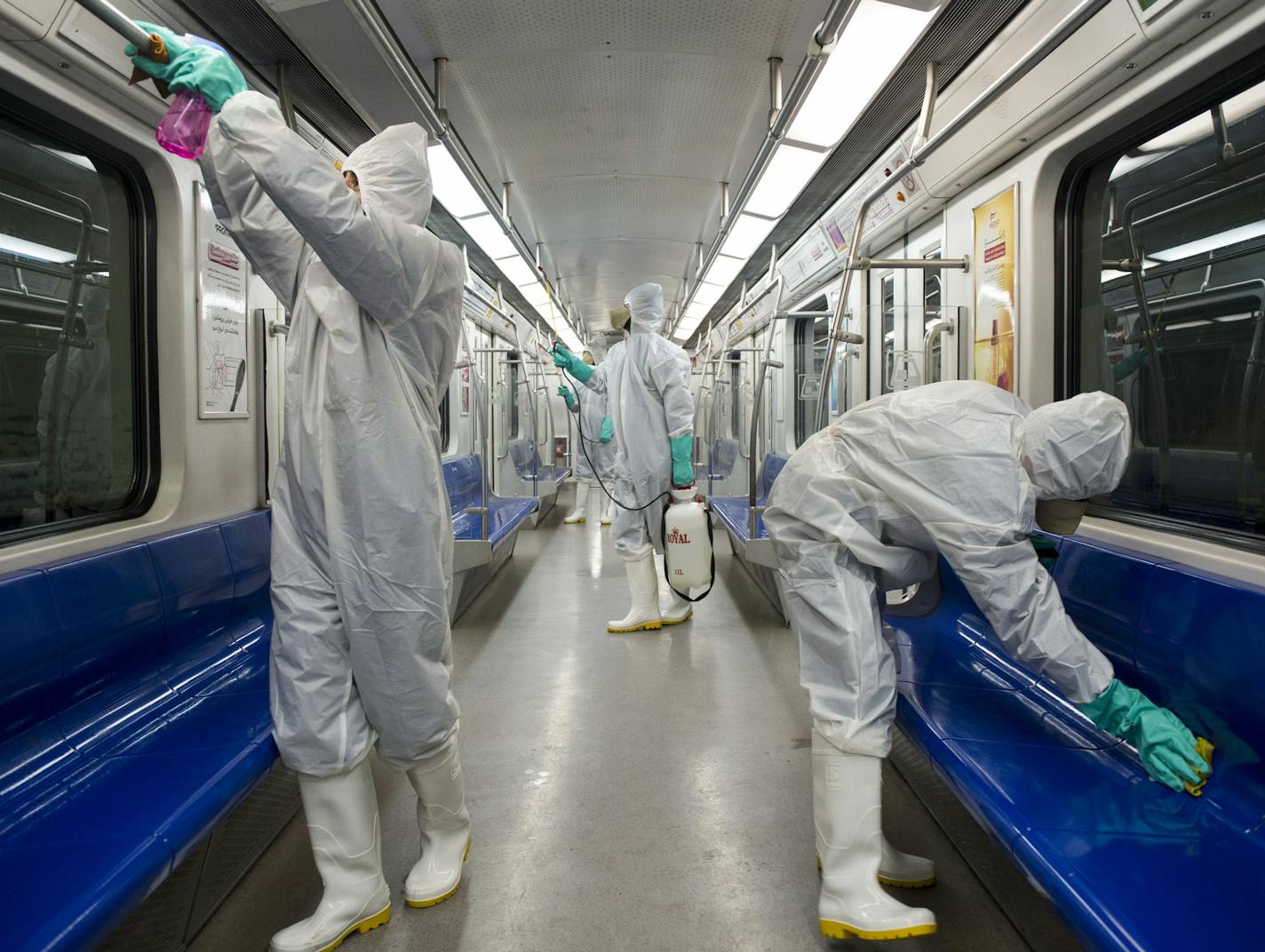 Workers disinfect subway trains against coronavirus in Tehran, Iran, in the early morning of Tuesday, Feb. 25, 2020. Iran's government said Tuesday that more than a dozen people had died nationwide from the new coronavirus, rejecting claims of a much higher death toll of 50 by a lawmaker from the city of Qom that has been at the epicenter of the virus in the country. (Sajjad Safari/IIPA via AP)