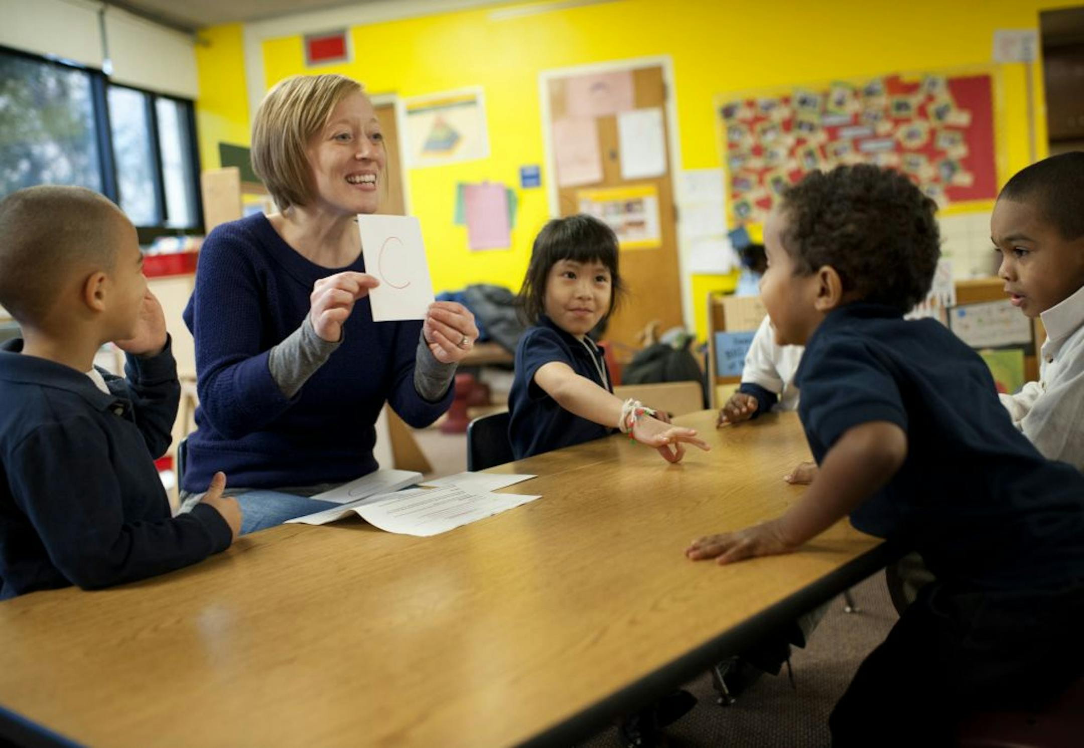 Teacher Jessica Freeberg taught letters of the alphabet to students in her afternoon pre-kindergarten class at Maxfield Magnet School in St. Paul. The school is one that received a federal aid grant announced Friday.