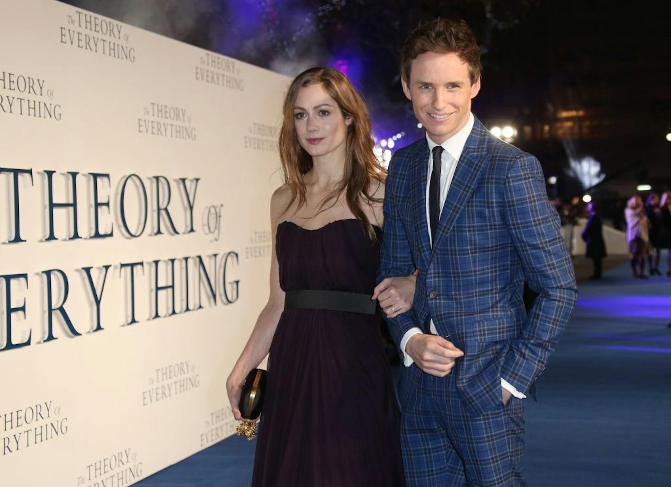 FILE - In this Tuesday, Dec. 9, 2014 file photo, actor Eddie Redmayne and Hannah Bagshawe arrive on the blue carpet for the UK premiere of "The Theory of Everything," at the Odeon in Leicester Square, central London.
