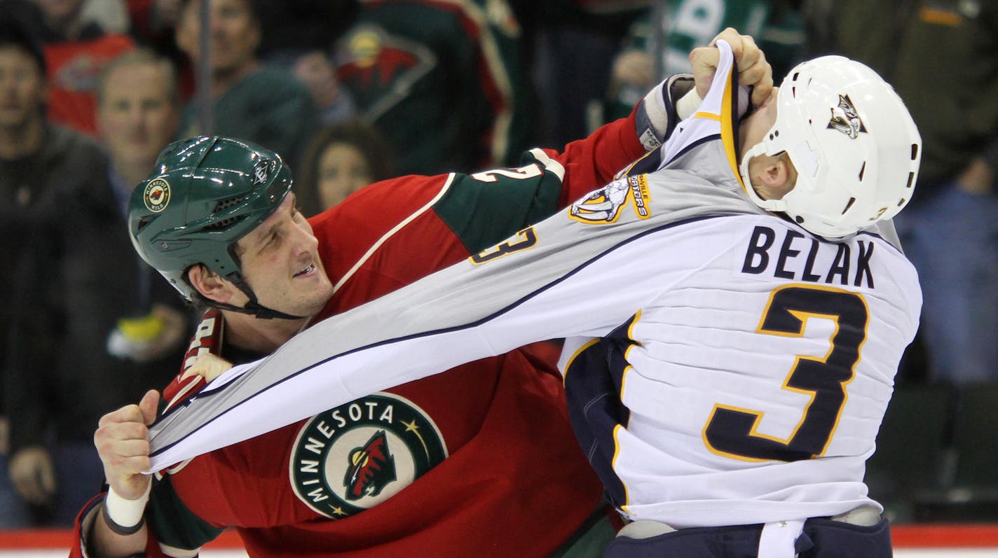 Minnesota Wild's Derek Boogaard and Nashville Predators' Wade Belak spar during first-period action at the Xcel Energy Center in St. Paul, Minnesota, Wednesday, December 2, 2009. (Jeff Wheeler/Minneapolis Star Tribune/MCT) ORG XMIT: MIN2015010713261090