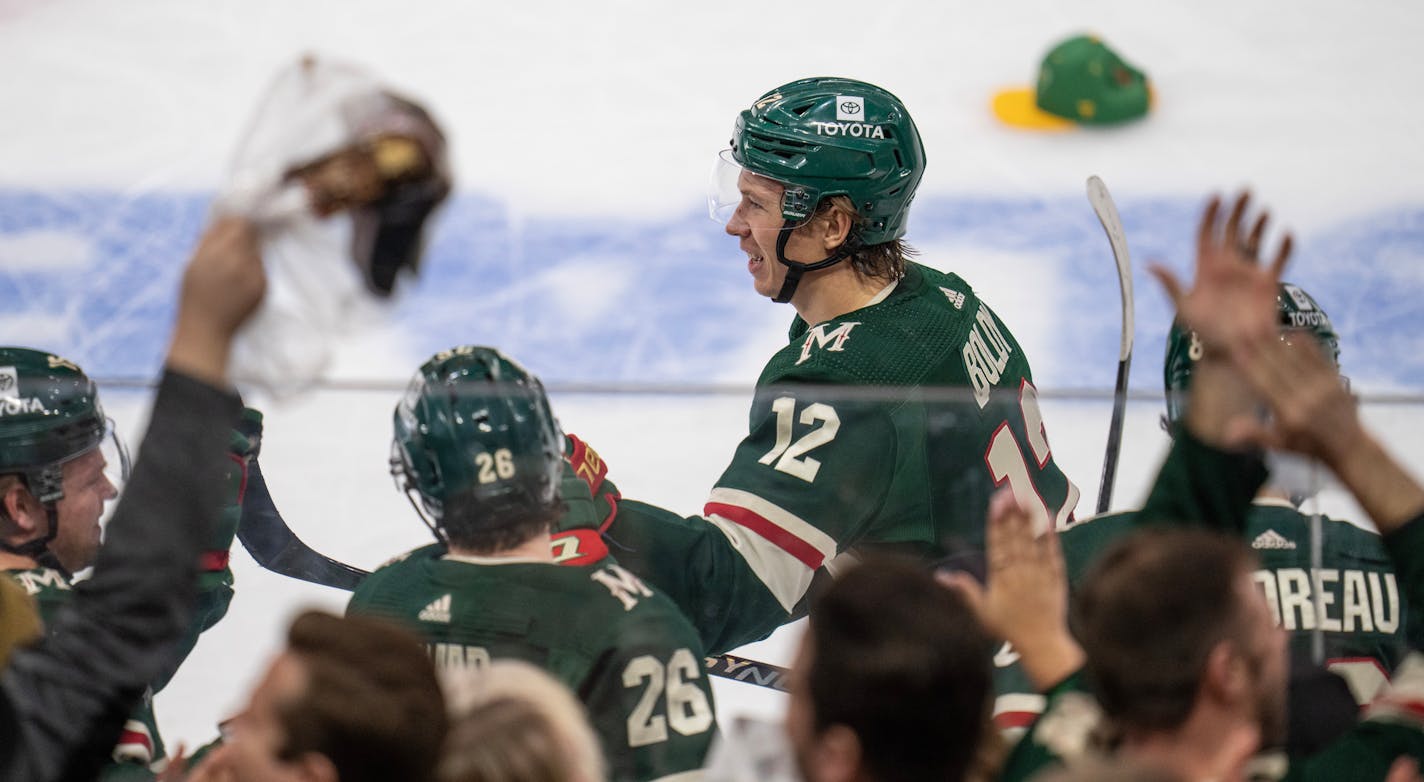 Fans threw hats on the ice as Minnesota Wild left wing Matt Boldy (12) celebrates his third period goal Sunday ,March,19,2023 in St.Paul, Minn.] JERRY HOLT • jerry.holt@startribune.come