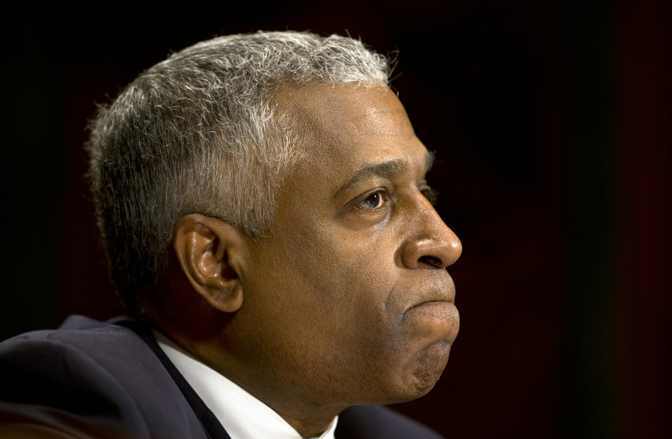 B. Todd Jones of Minnesota, President Barack Obama's nominee for director of the Bureau of Alcohol, Tobacco, Firearms and Explosives listens as he testifies on Capitol Hill in Washington, Tuesday, June 11, 2013, before the Senate Judiciary Committee hearing on his nomination. Five months after President Barack Obama called on lawmakers to approve his choice to lead the Bureau of Alcohol, Tobacco, Firearms and Explosives, the Senate is considering the nomination. (AP Photo/Jacquelyn Martin)