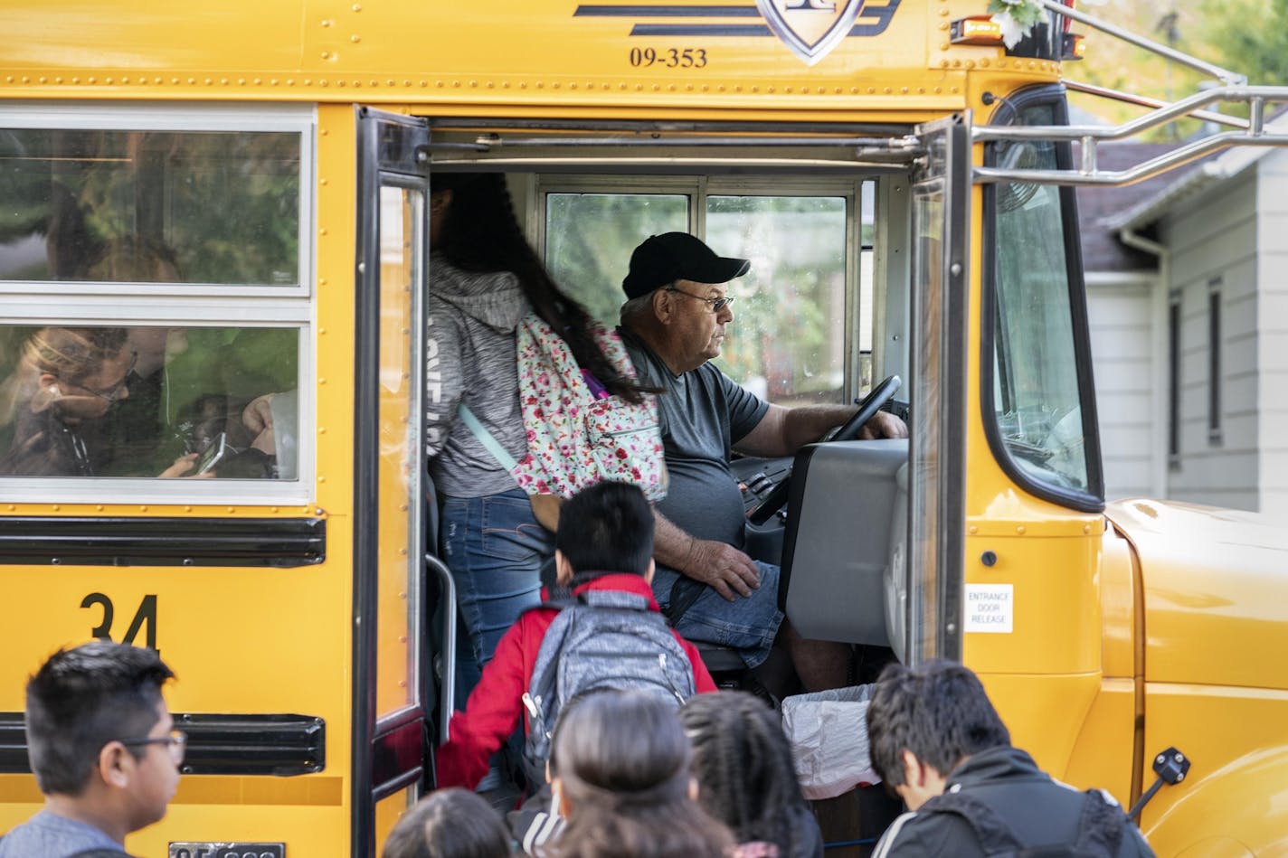 Don Brink picks up students on his route in Worthington, Minn. The town has seen an influx of undocumented children, but Brink does not support a plan to expand local schools. MUST CREDIT: Photo for The Washington Post by Courtney Perry.