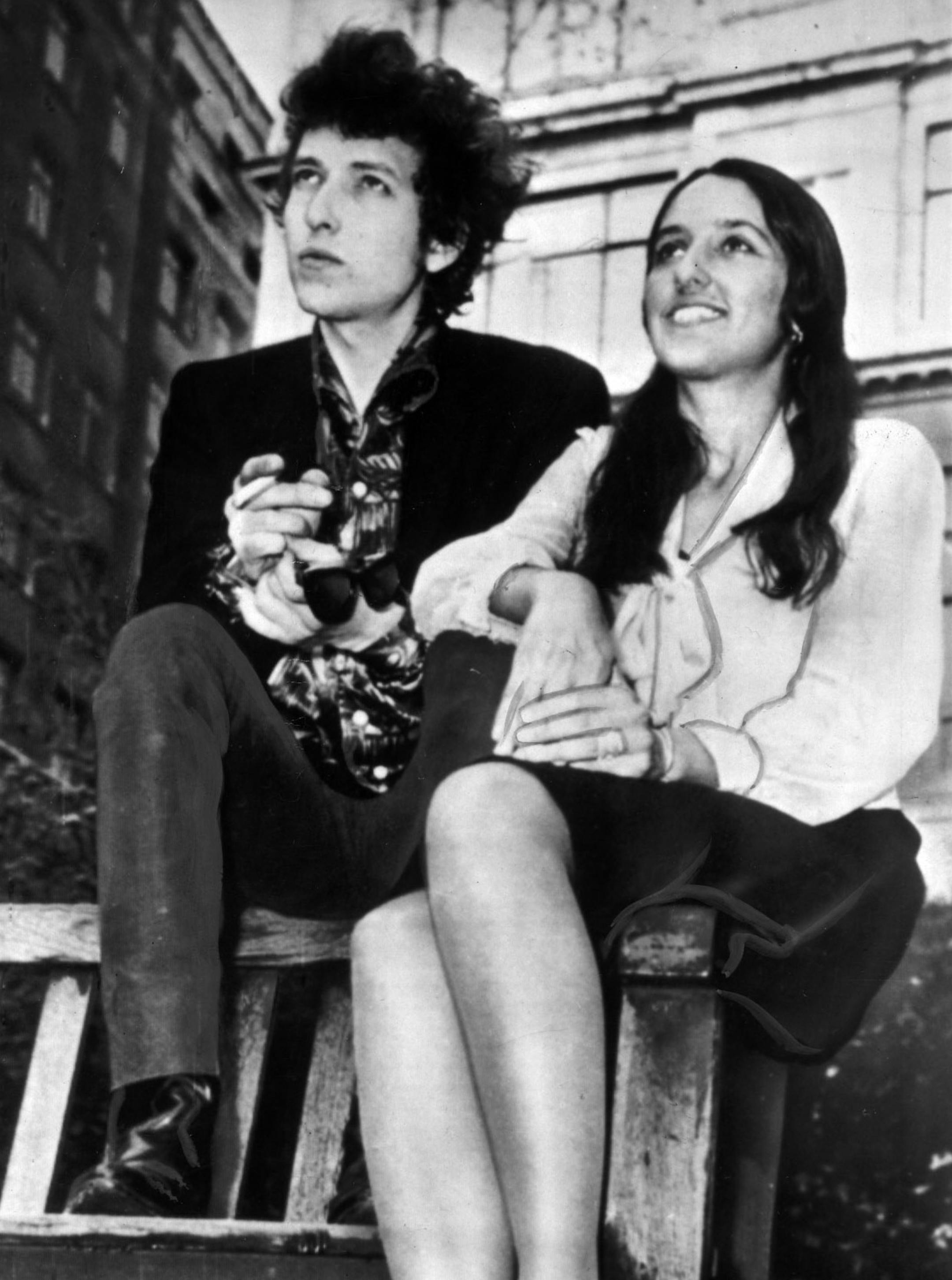 Folk singer musicians Bob Dylan (at left) and Joan Baez (right) are shown in London in 1965. File photo. ORG XMIT: MIN2013012215482198