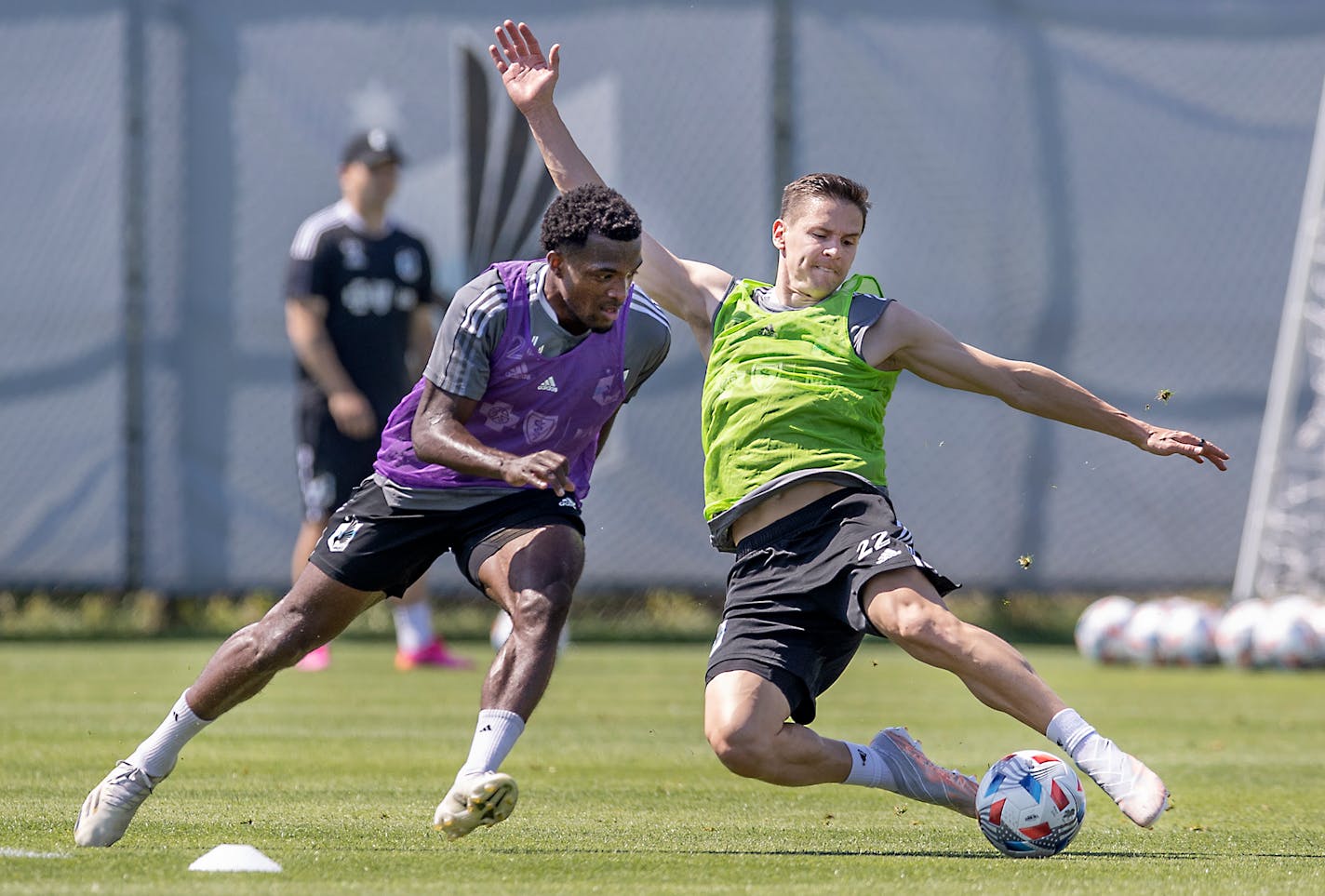 Minnesota United FC defender Jukka Raitala, right, and midfielder Justin McMaster, left, battled for the ball during practice at the National Sports Center, Tuesday, May 18, 2021in Blaine, MN. ] ELIZABETH FLORES • liz.flores@startribune.com