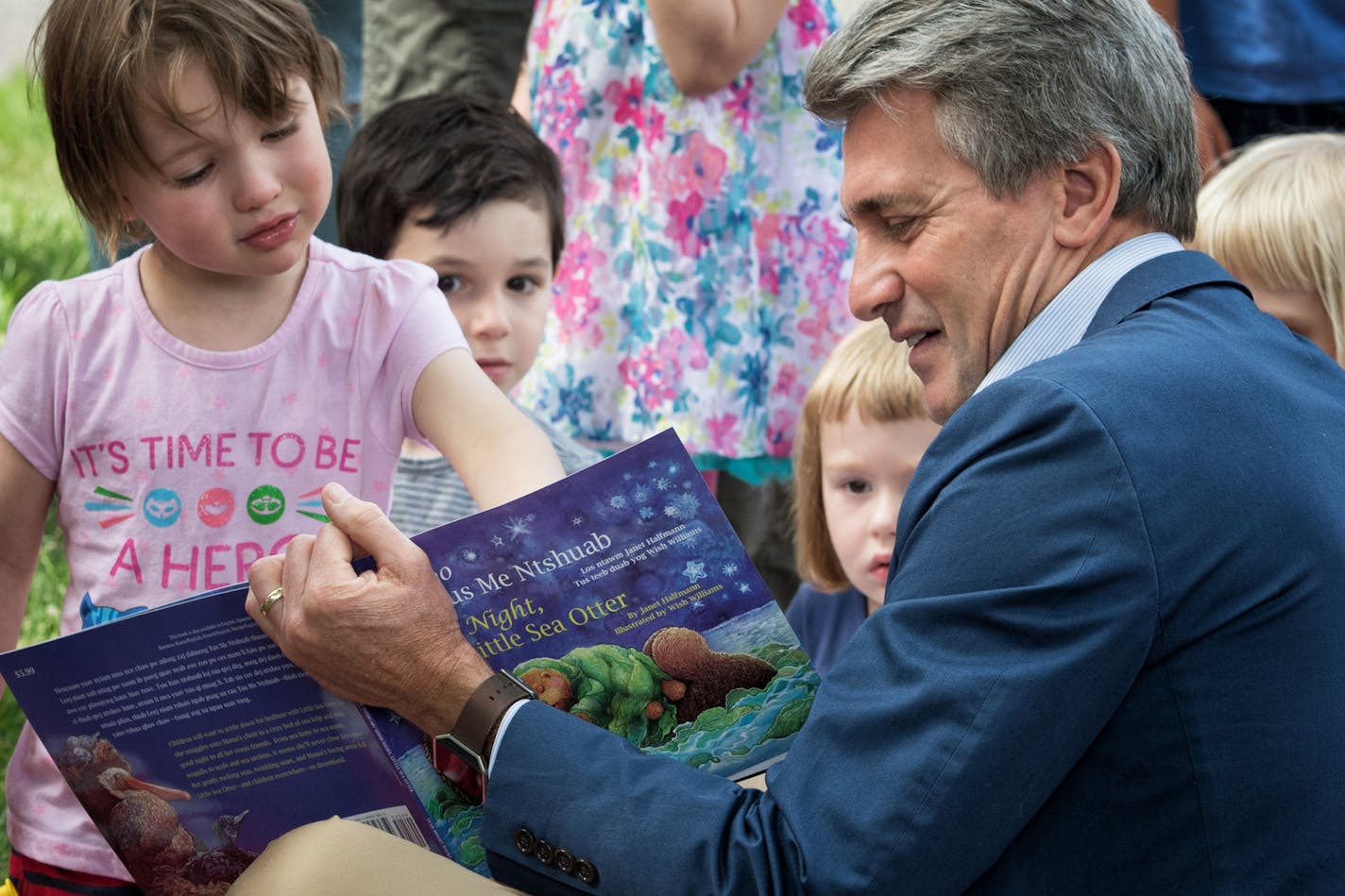 Minneapolis Foundation president and CEO R.T. Rybak read Good Night, Little Sea Otter to a group of kids at the Book It to the Parks event.