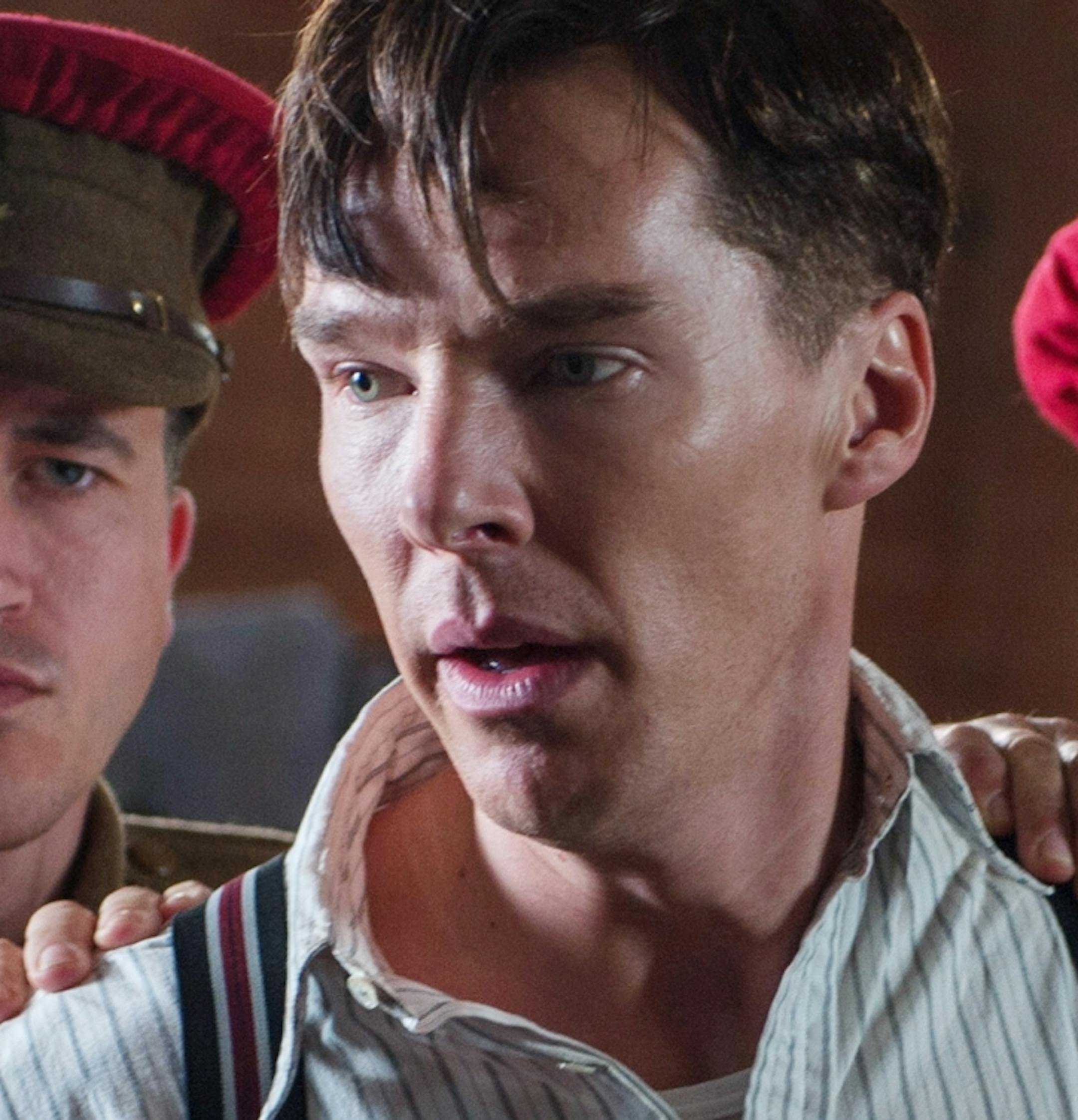 This image released by The Weinstein Company shows Benedict Cumberbatch, center, in a scene from the film, "The Imitation Game." (AP Photo/The Weinstein Company, Jack English)