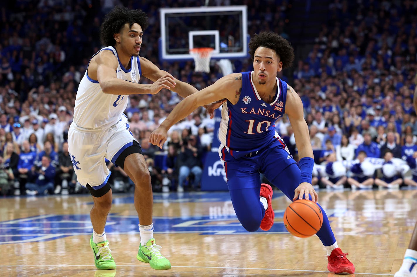 Kansas' Jalen Wilson drives against Kentucky's Jacob Toppin during the second half