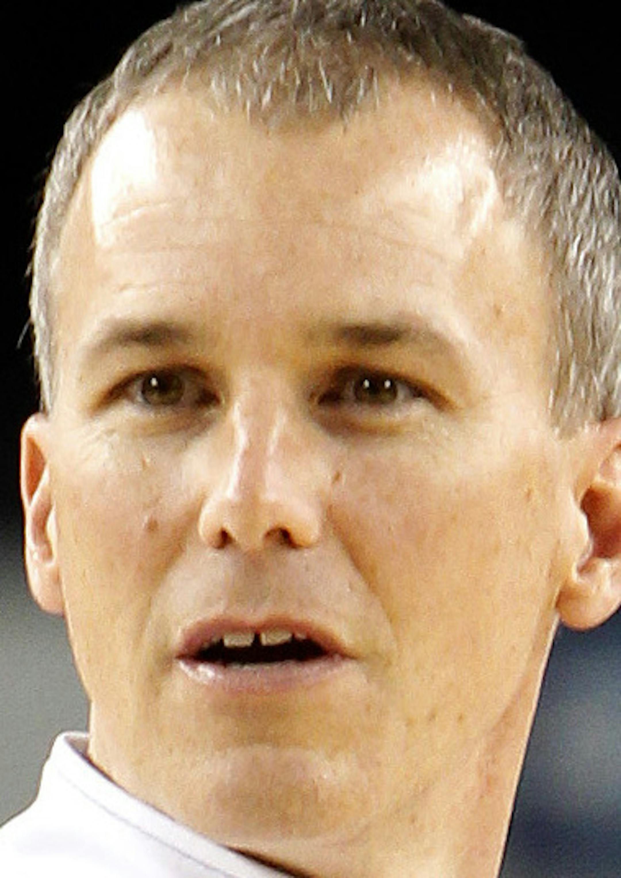 Florida Gulf Coast head coach Andy Enfield walks onto the court for practice at Cowboys Stadium in Arlington, Texas, on Thursday, March 28, 2013. The Eagles meet Florida in the NCAA Tournament on Friday. (Richard W. Rodriguez/Fort Worth Star-Telegram/MCT)