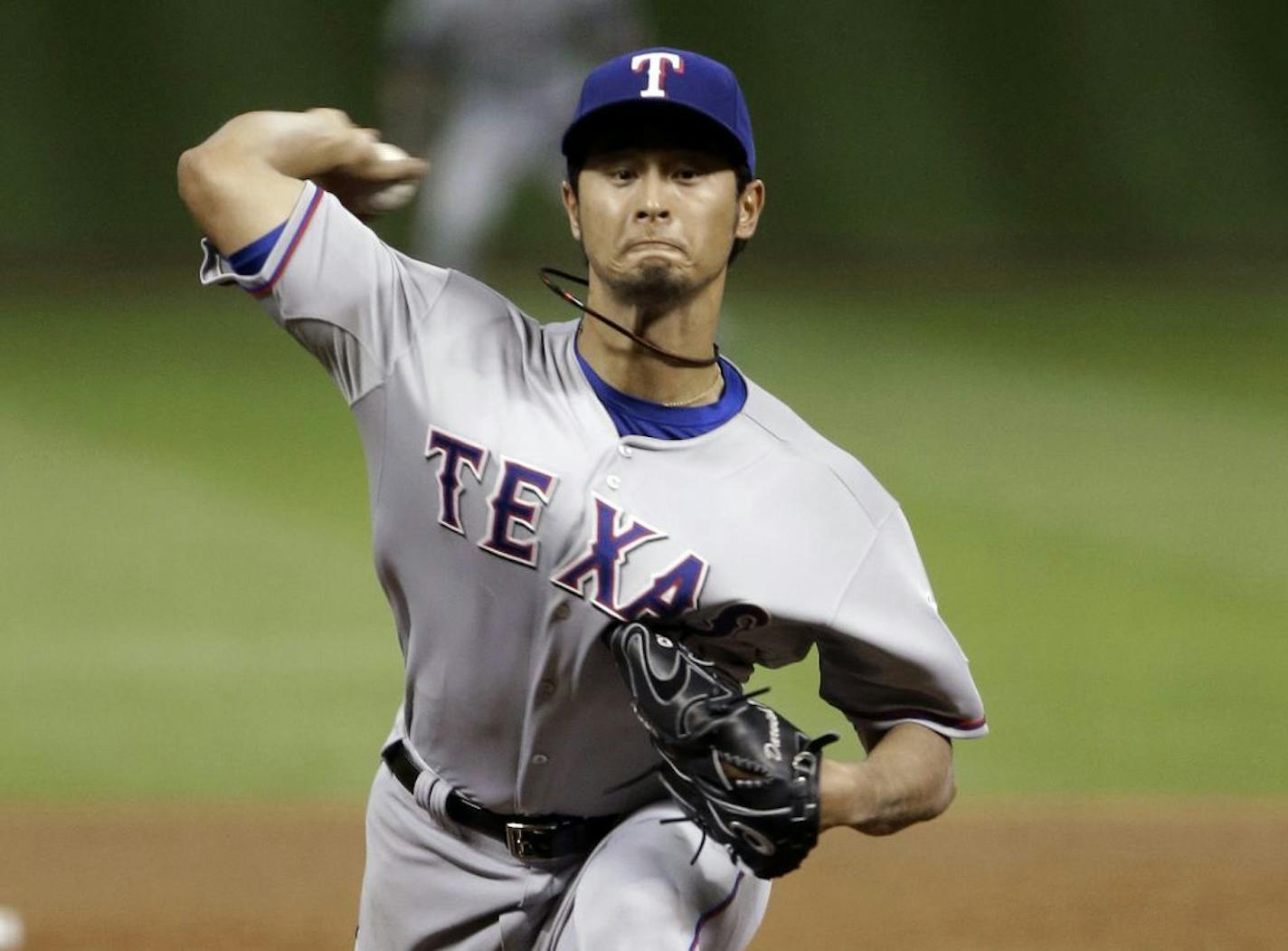 Texas Rangers' Yu Darvish delivers a pitch against the Houston Astros in the fifth inning